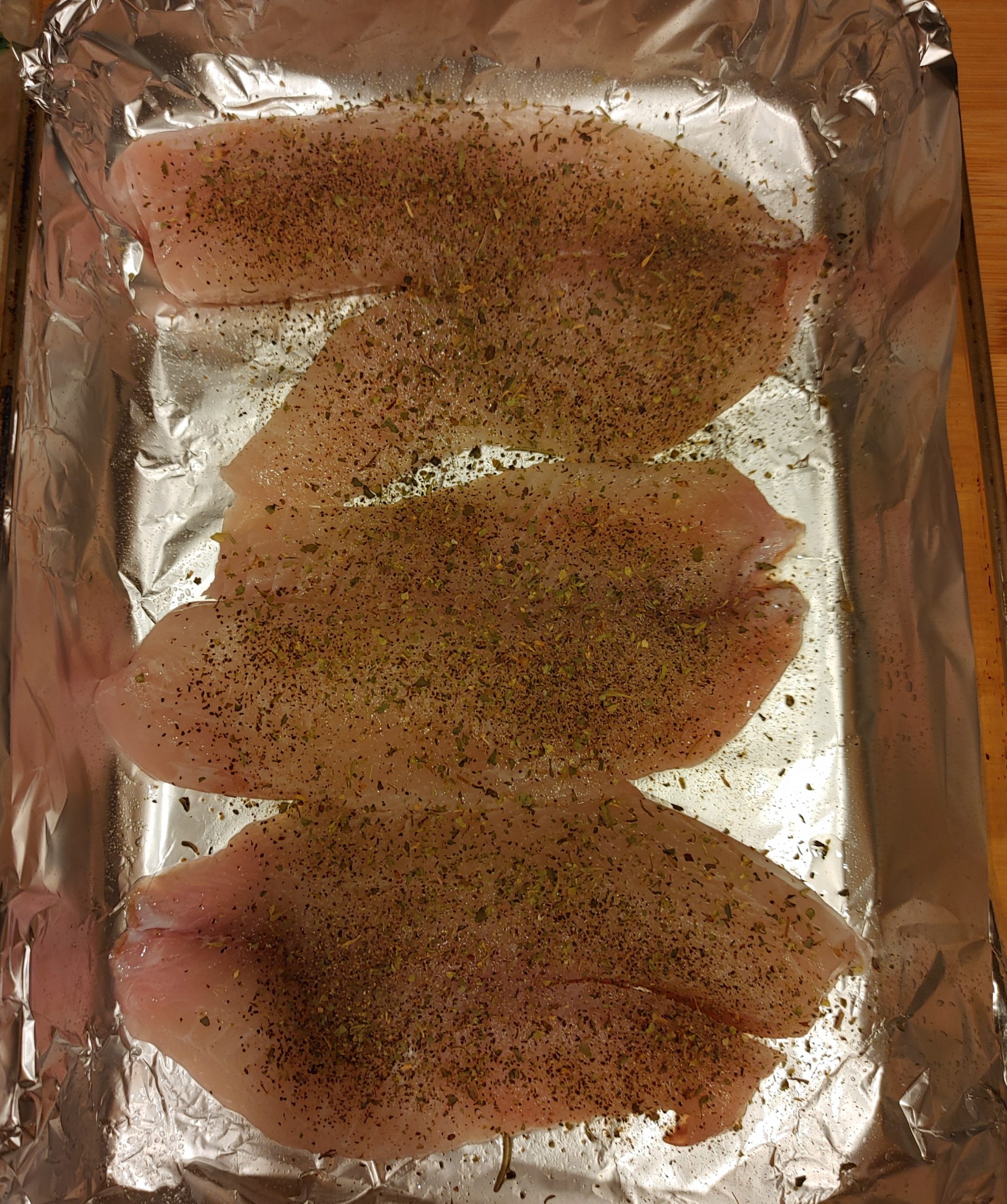 DRY THE TILAPIA AND SEASON WITH SALT AND PEPPER