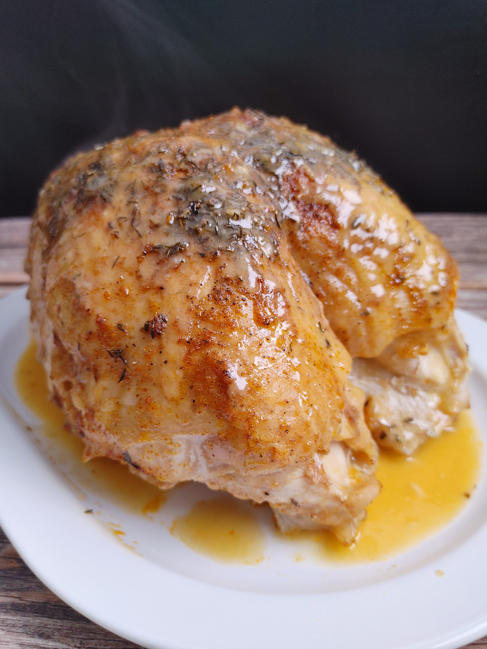 CROCK POT TURKET BREAST WITH GRAVY ON A PLATE