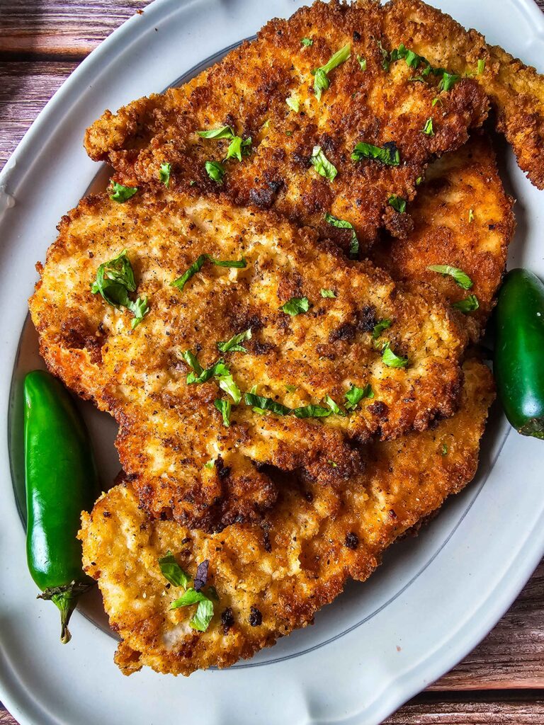 PLATE FULL OF CRISPY CHICKEN FILETS