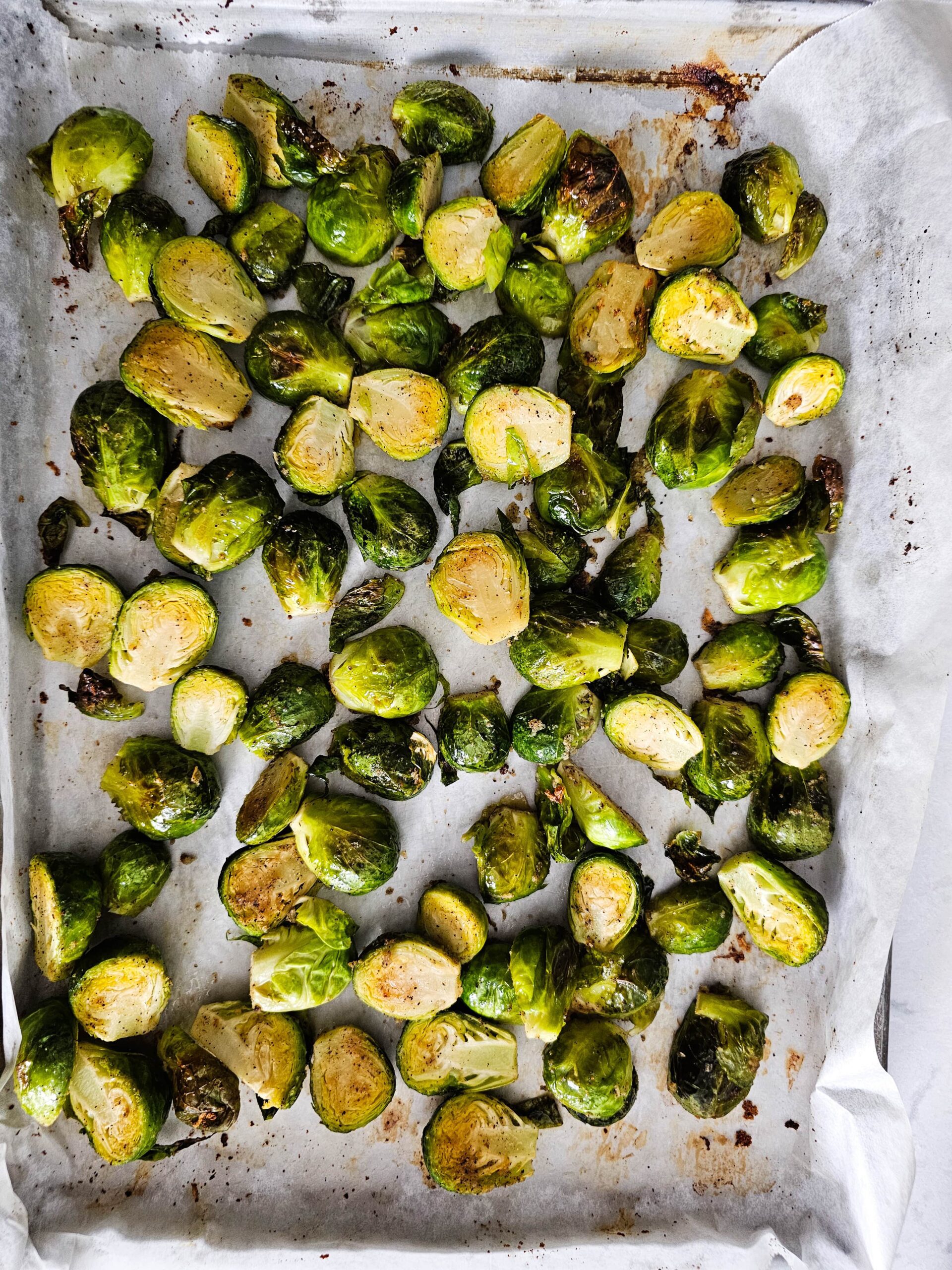 LARGE BAKING SHEET OF ROASTED BRUSSELS SPROUTS