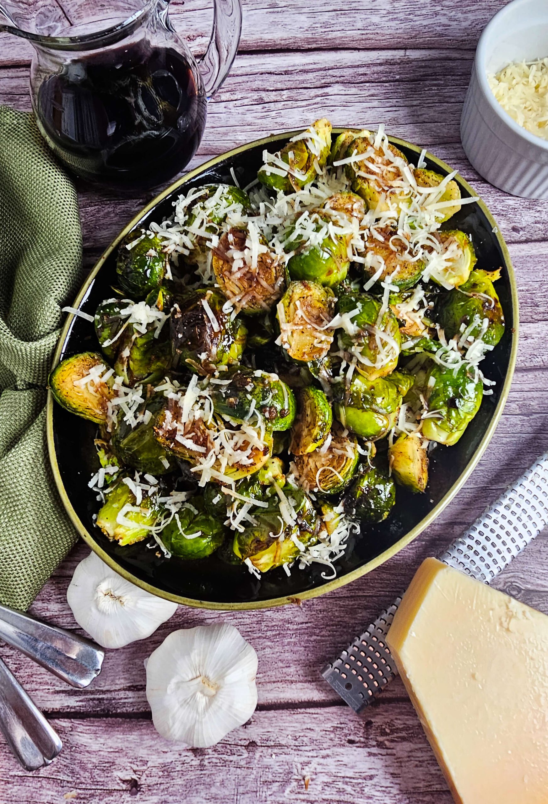 LARGE PLATTER OF BALSAMIC GLAZED BRUSSELS SPROUTS WITH SPRINKLE OF PARMESAN CHEESE