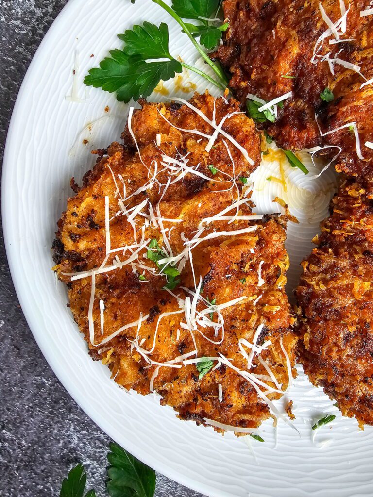 Close-up of crispy parmesan panko crust on pan-fried ranch chicken cutlet