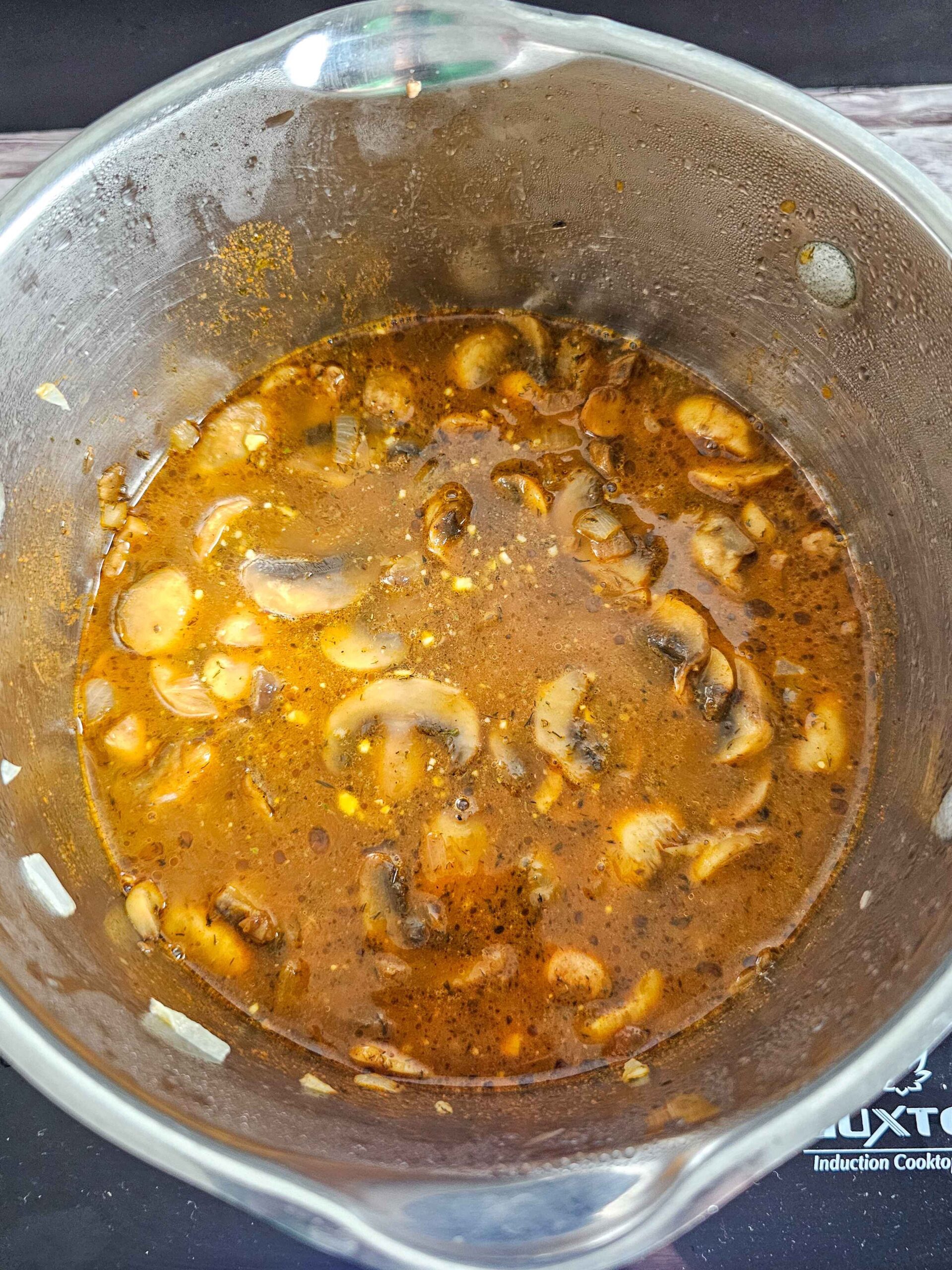 ADD CHICKEN BROTH, DILL WEED AND PAPRIKA TO THE SAUCE PAN.