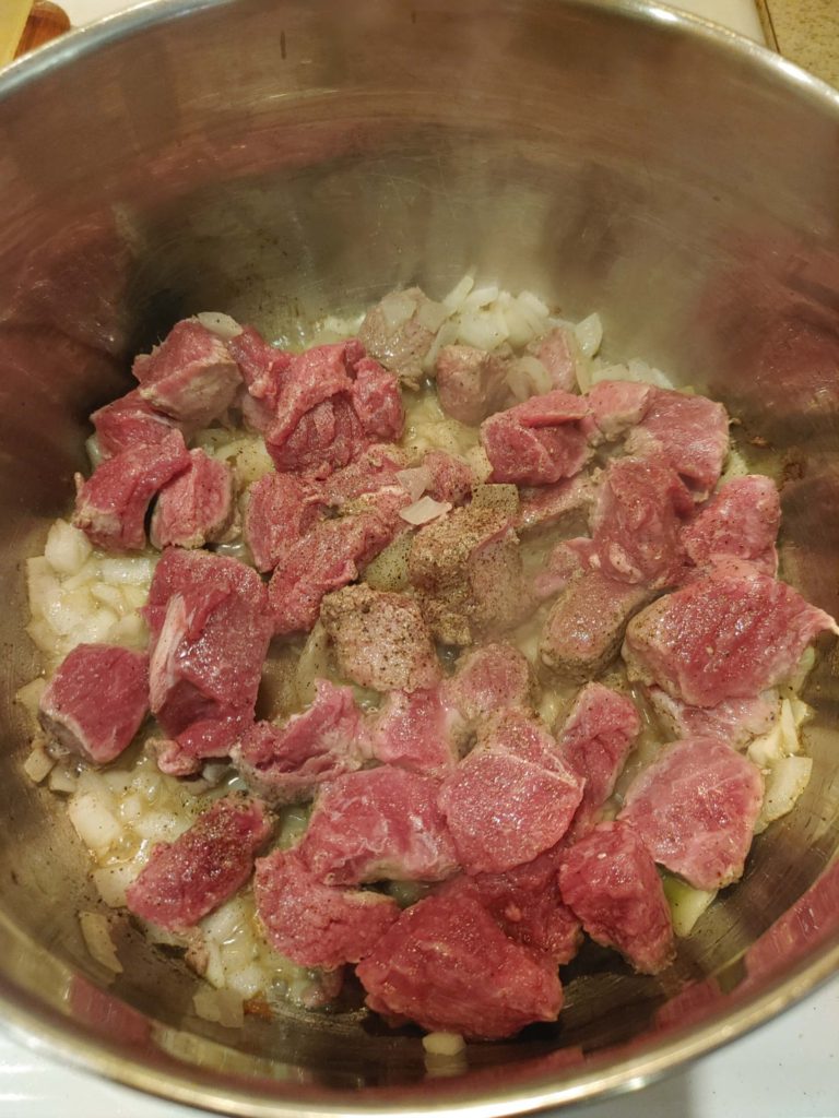 ONIONS AND BEEF COOKING TOGETHER