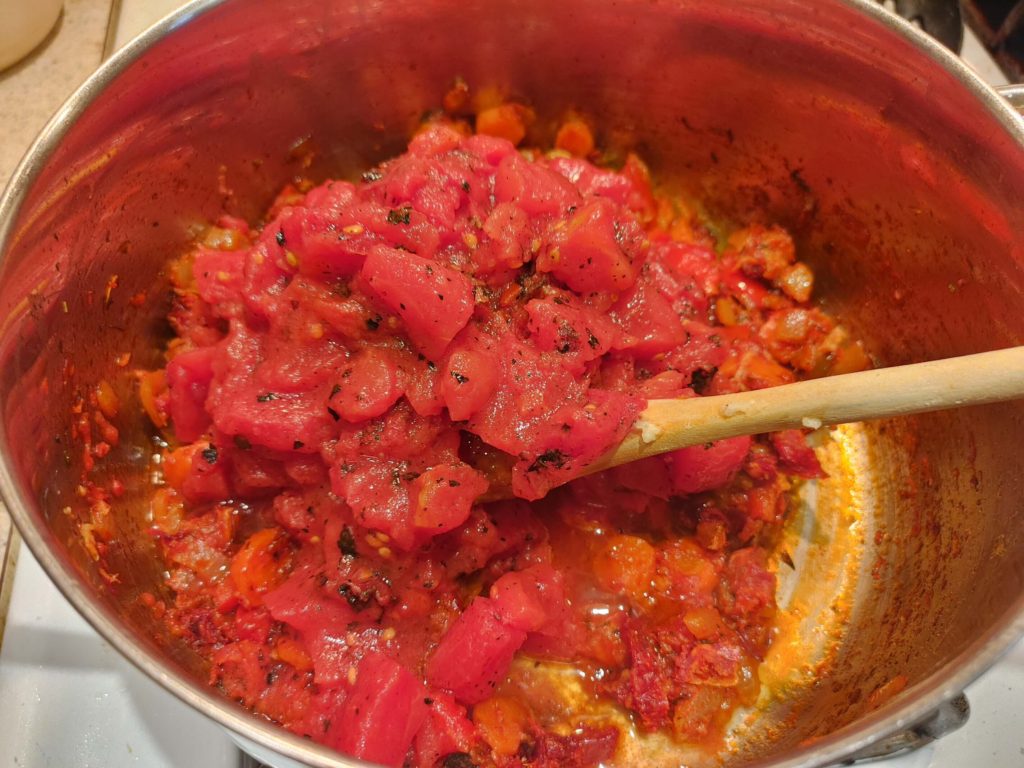 ADDING FIRE ROASTED TOMATOES