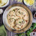 CHICKEN BREASTS COVERED IN THE MARRY ME CHICKEN SAUCE GARNISHED WITH BASIL AND SUN DRIED TOMATO