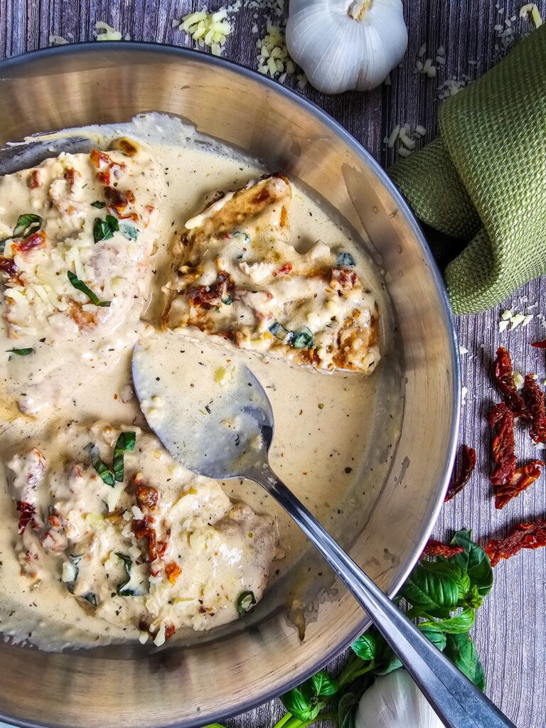 Easy homemade Marry Me Chicken recipe served with creamy parmesan sun-dried tomato sauce