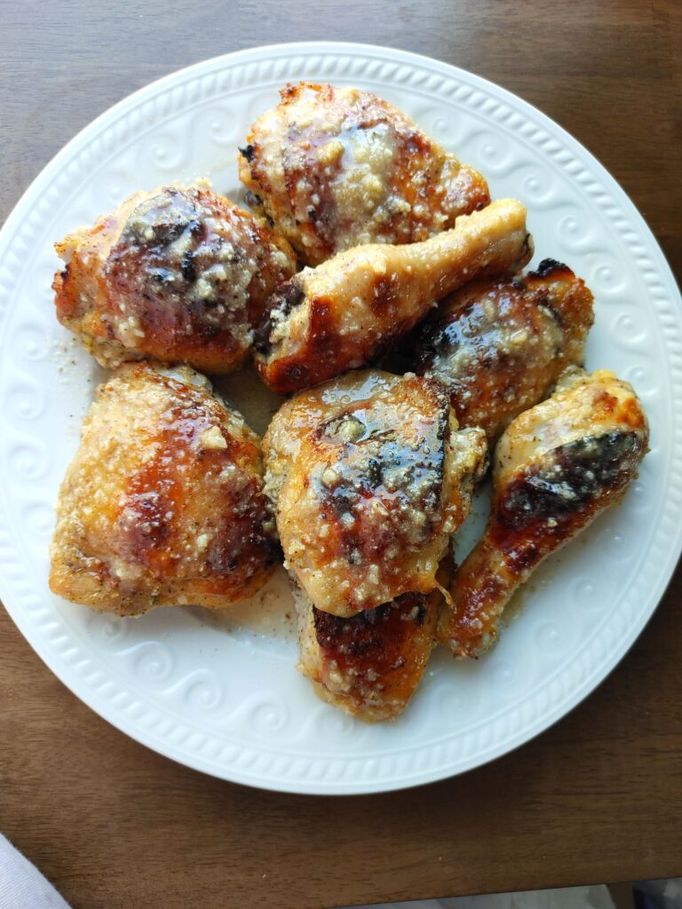 honey garlic parmesan chicken legs and thighs with golden glaze