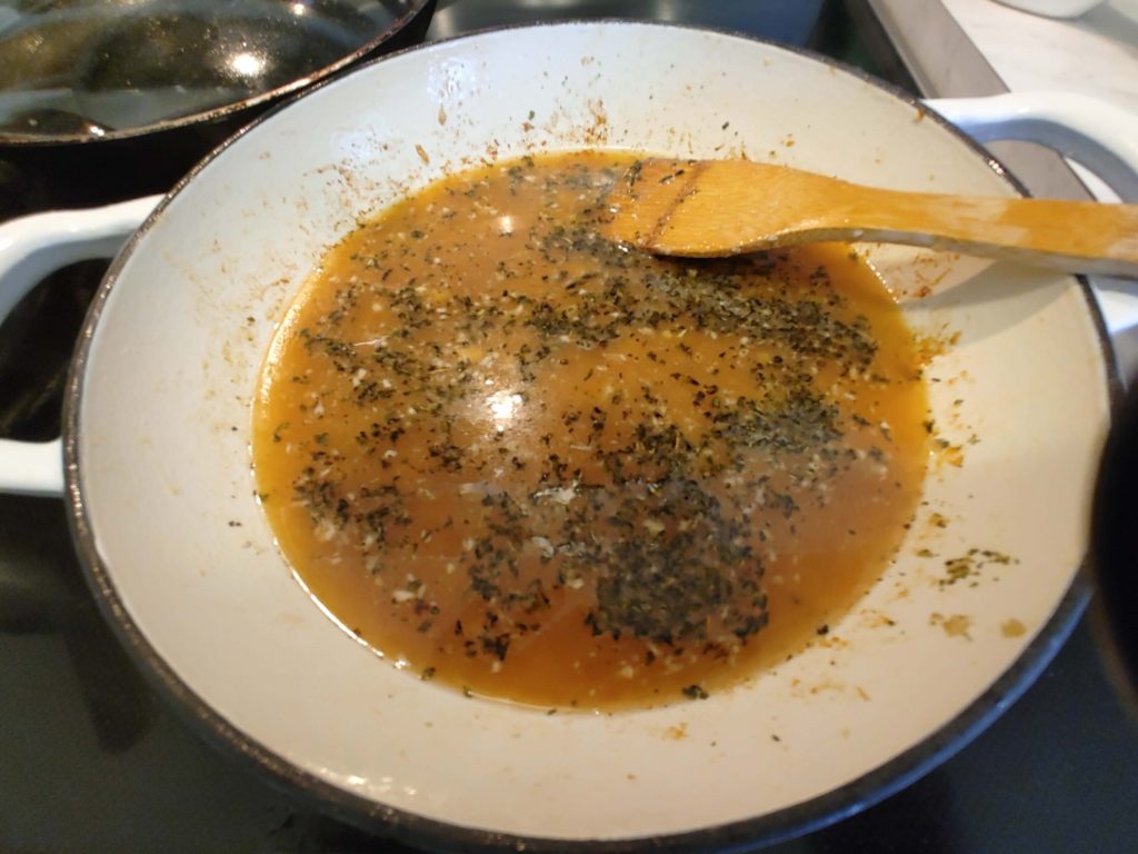 ADDING HERBS AND DEGLAZING THE DUTCH OVEN