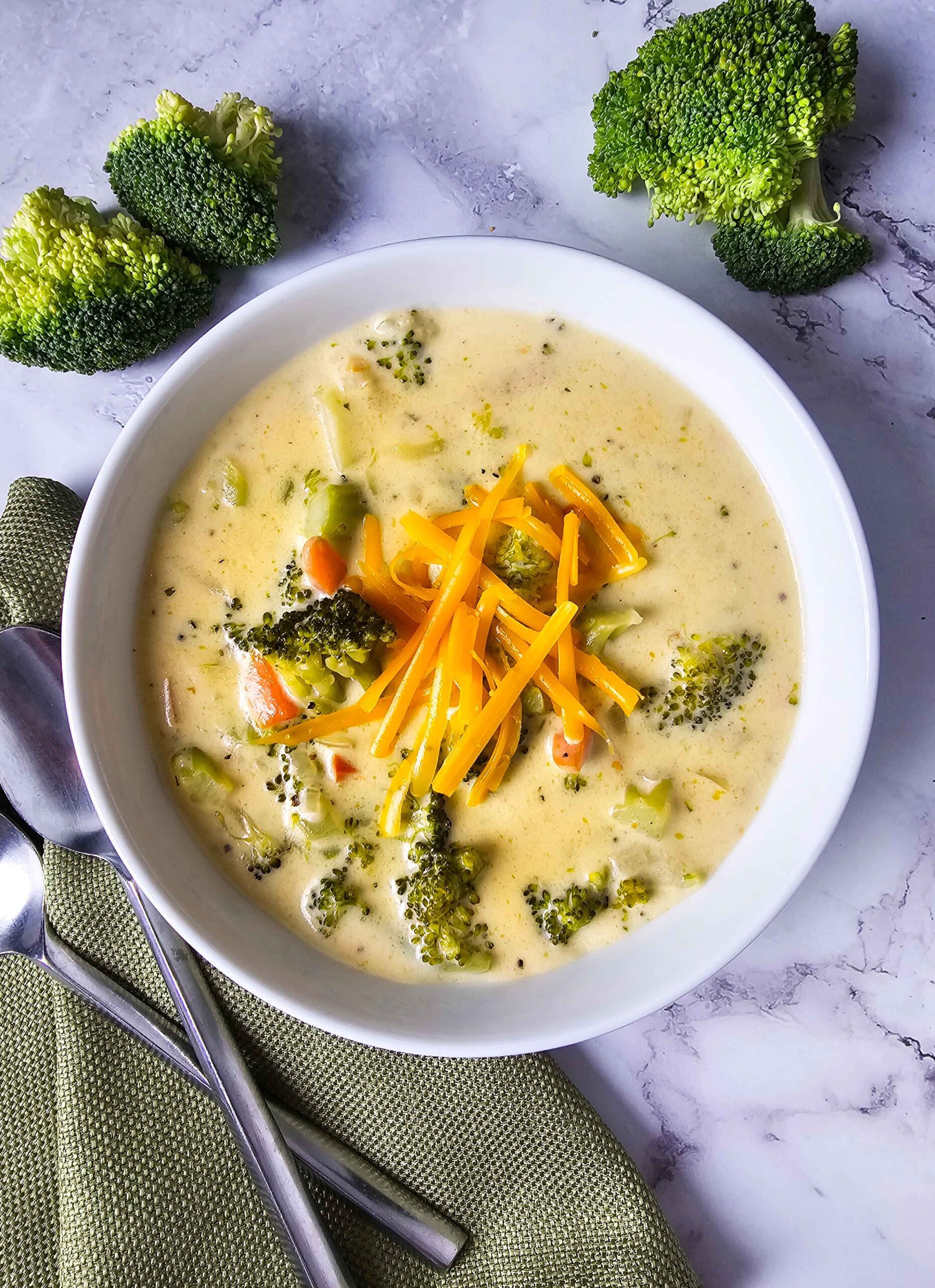 SERVE THE SOUP AND GARNISH WITH CROUTONS AND CHEDDAR CHEESE