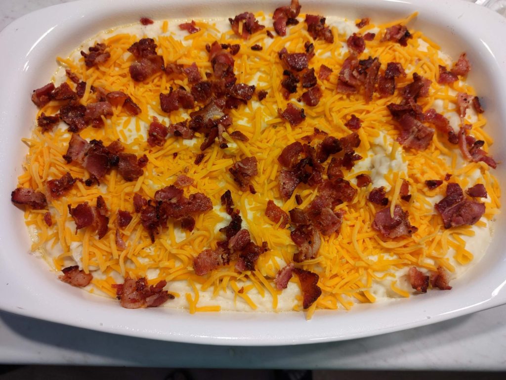 SPRINKLED WITH CHEESE AND BACON
