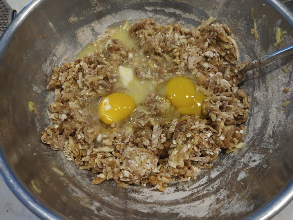ADDING BUTTER AND EGGS