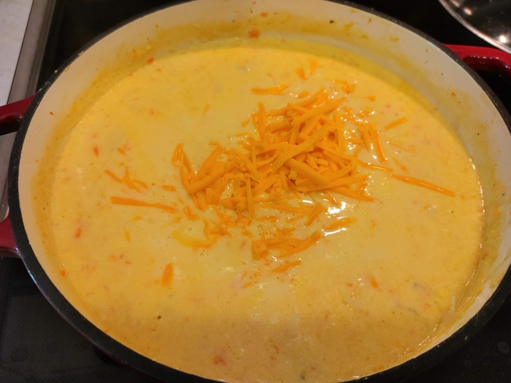 ADDING CHEESE TO THE SOUP