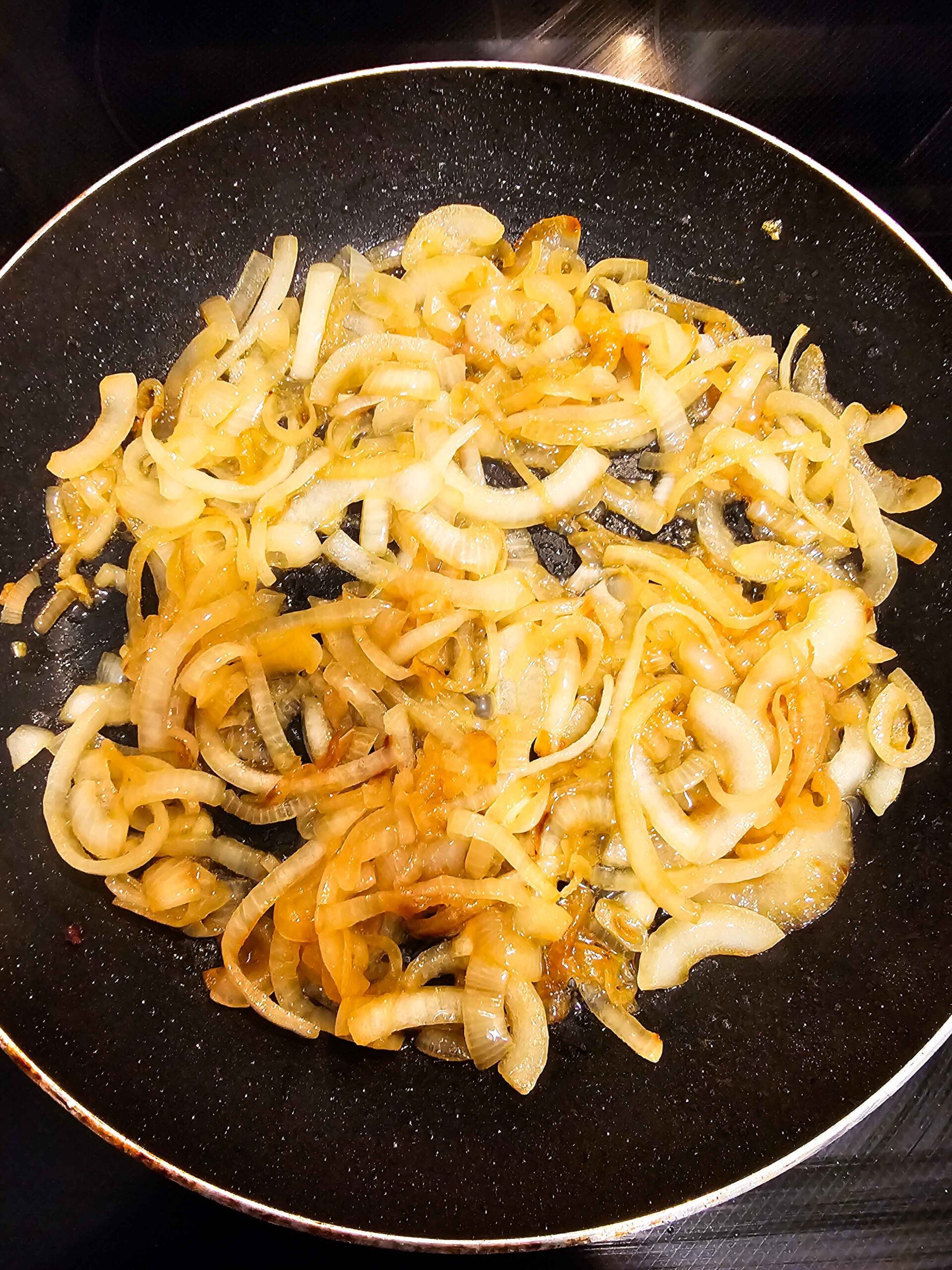 CARMELIZE THE ONIONS ON LOWER HEAT 20-25 MINUTES