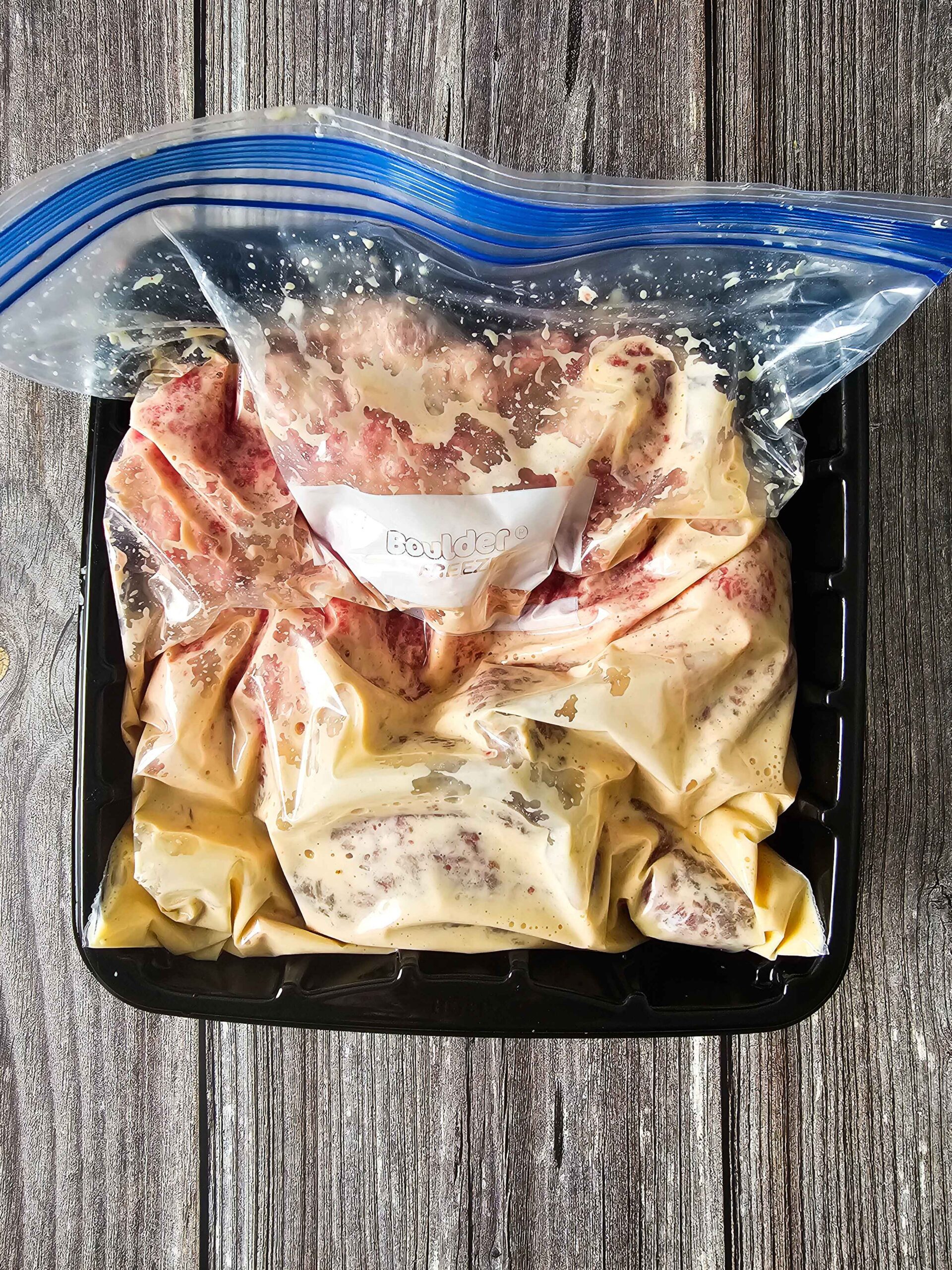 MARINATE THE CUBED STEAK AND REFRIGERATE