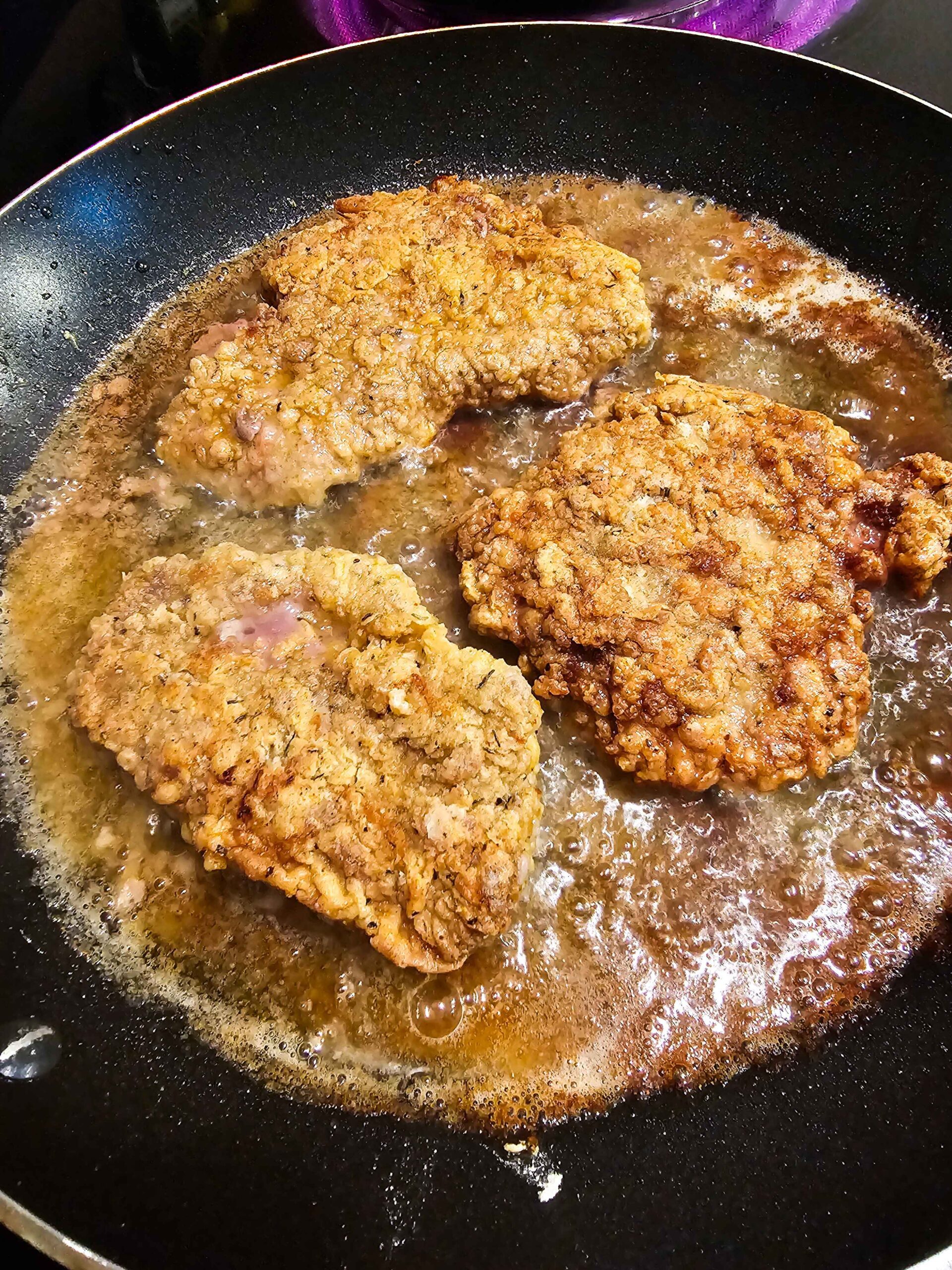 FRYTHE DREDGED CUBED STEAK UNTIL CRISPY