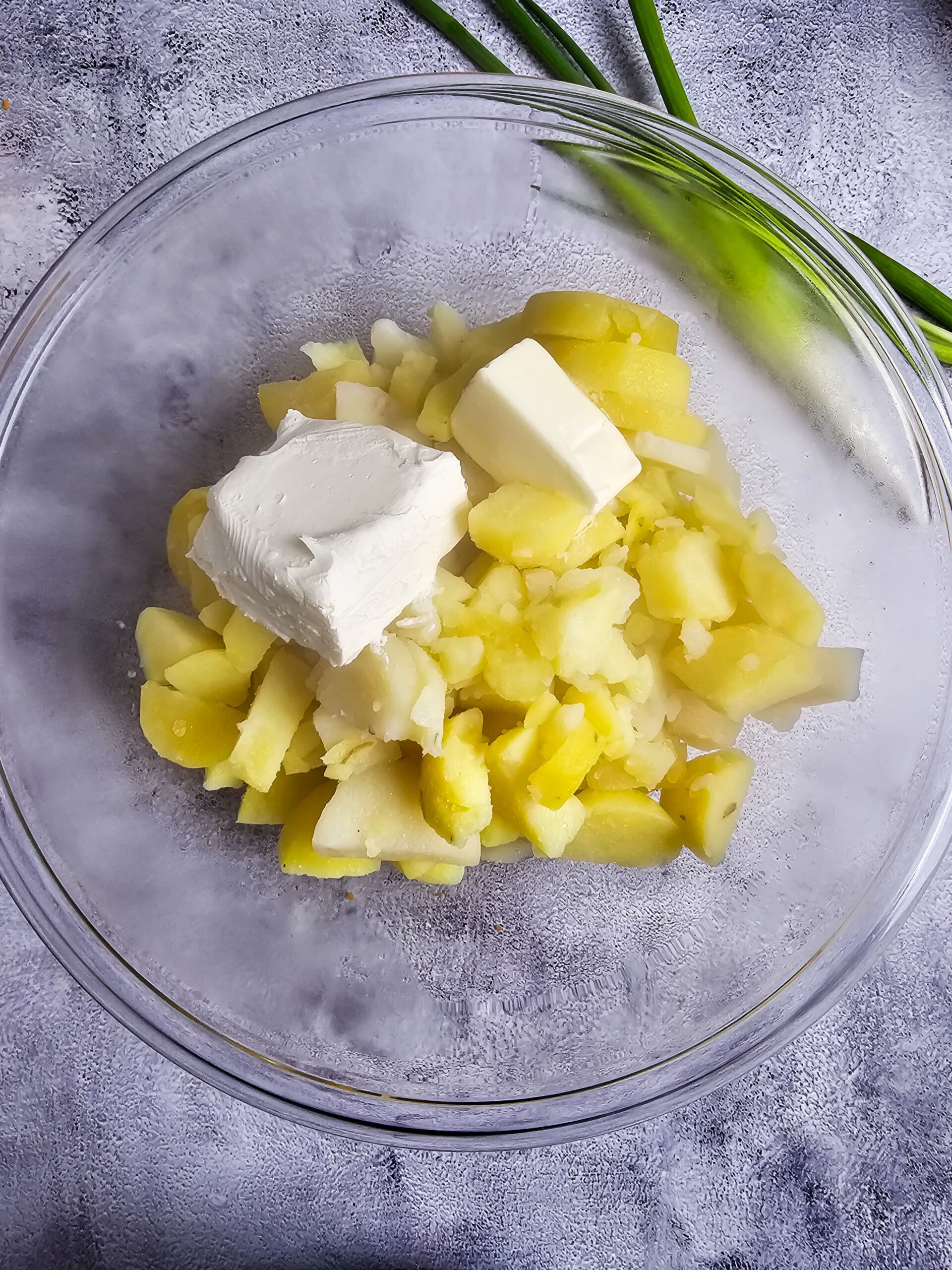 ADD THE MILK, CREAM CHEESE, AND BUTTER.