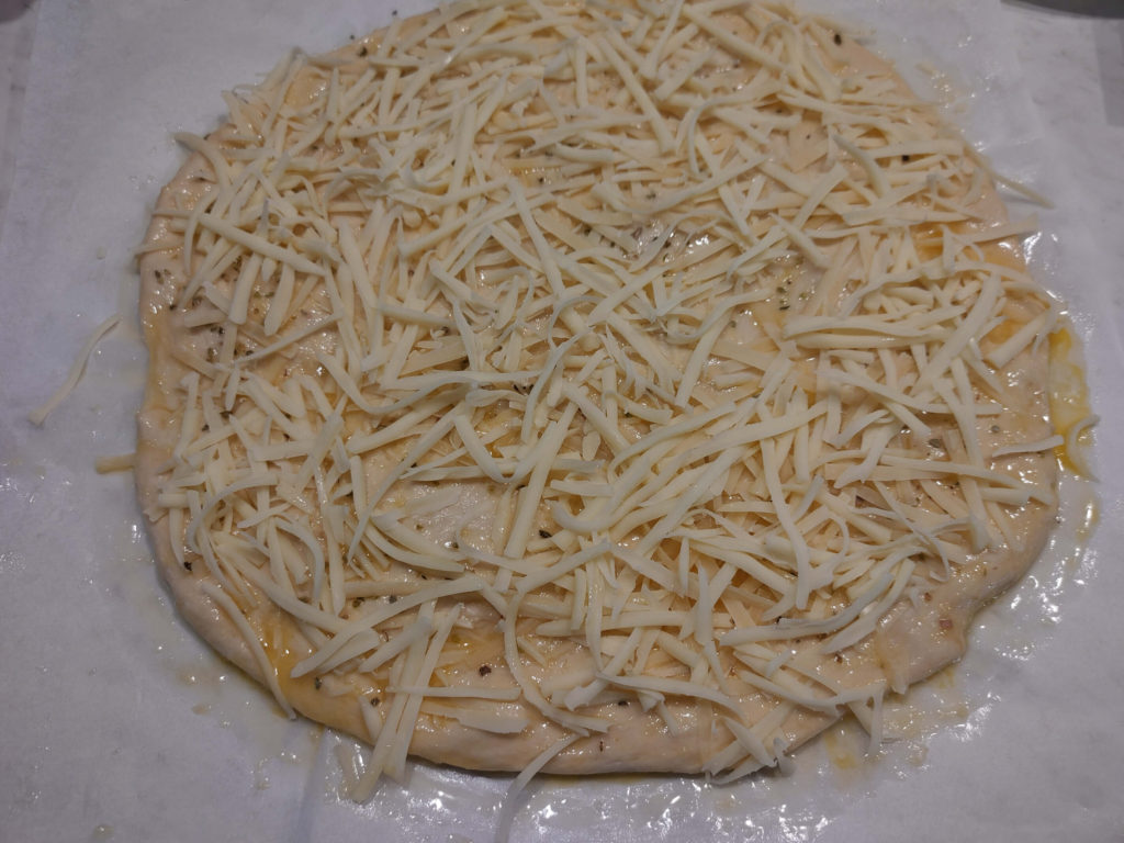 Dough Sprinkled with Cheese