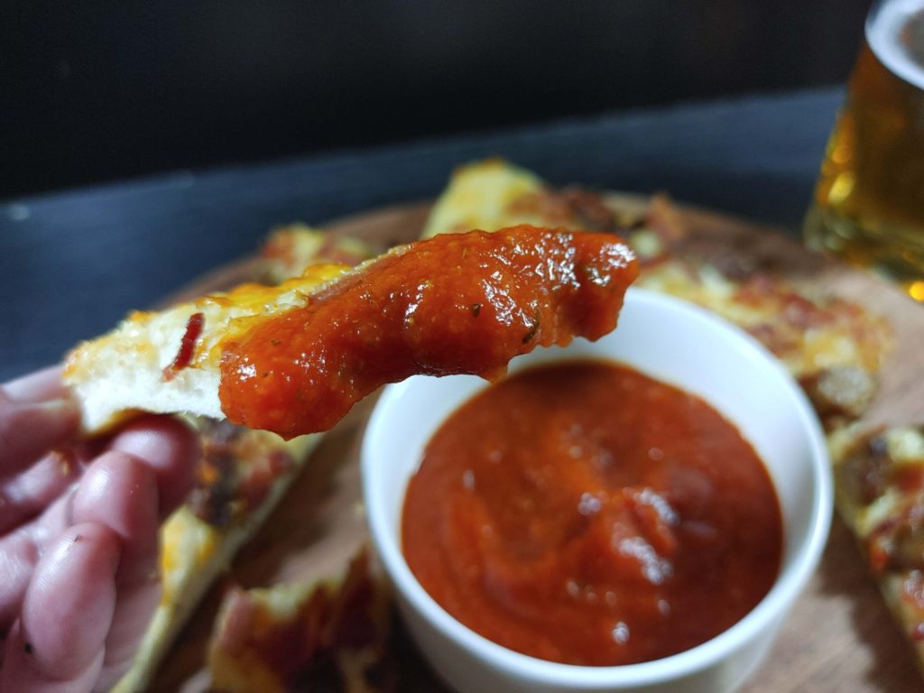 CHEESE BREADSTICKS DIPPED IN MARINARA