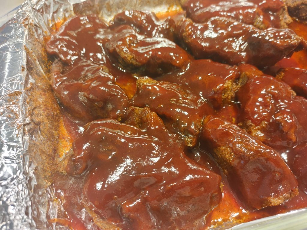 RIBS SMOOTHERED IN BARBECUE SAUCE