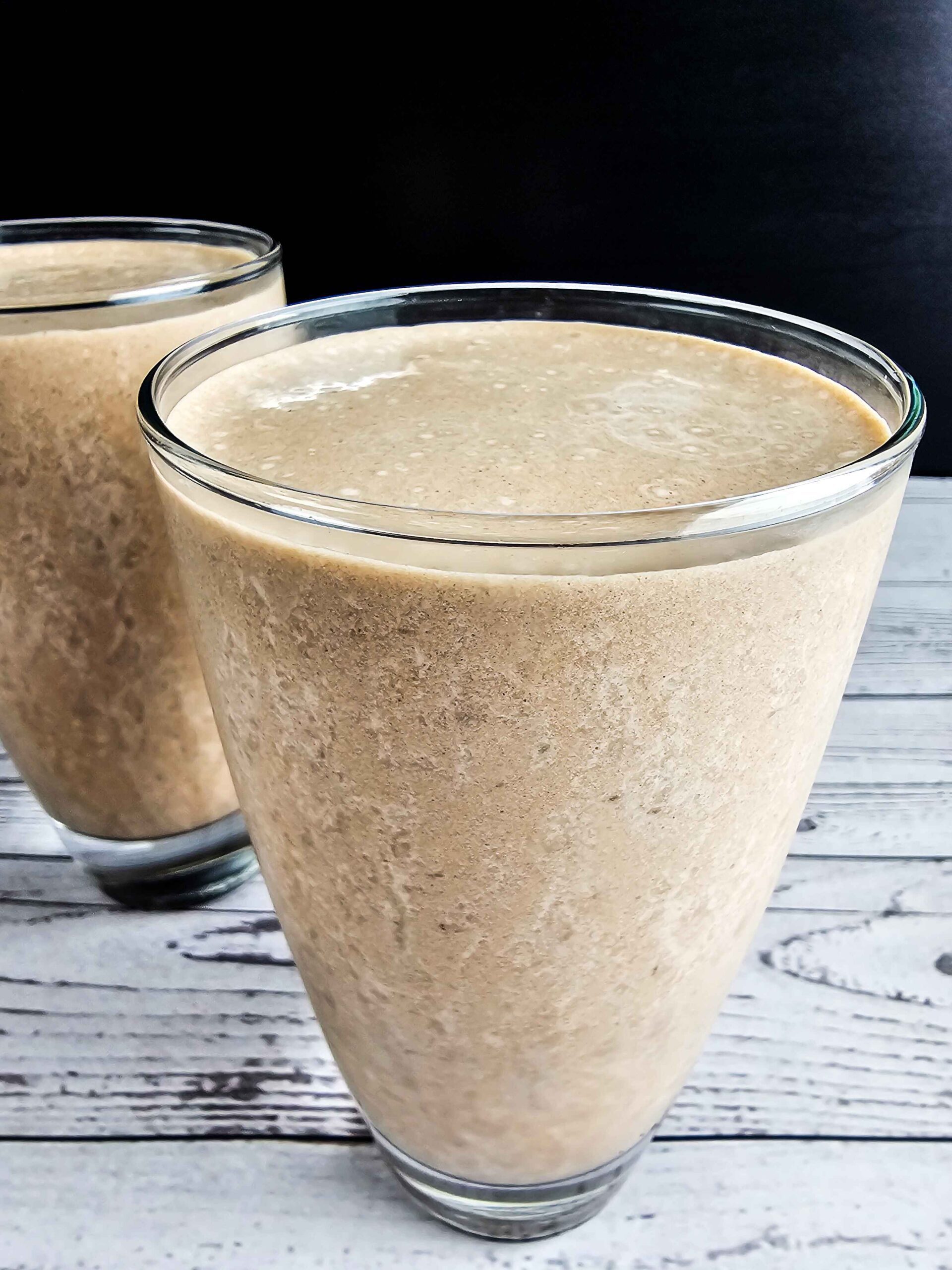 POURED INTO TWO TALL GLASSES AND READY TO SERVE