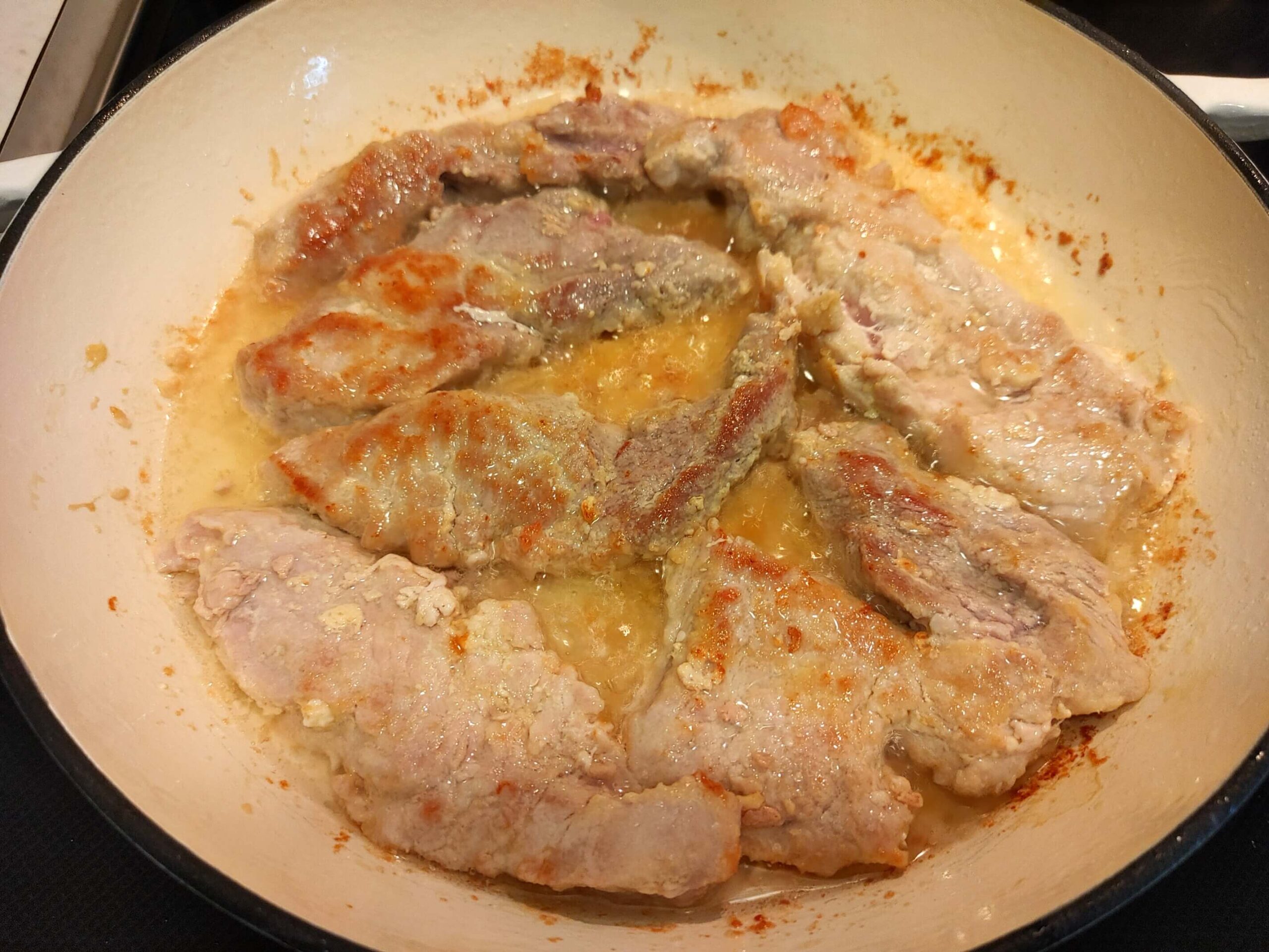 FRY THE PORK IN A HOT SKILLET UNTIL GOLDEN BROWN ON EACH SIDE