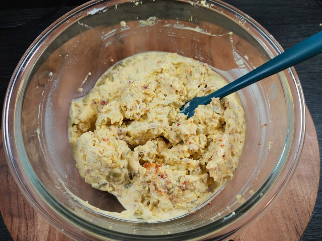 WHIPPED EGG YOLK MIXTURE READY TO PIPE INTO WHITES