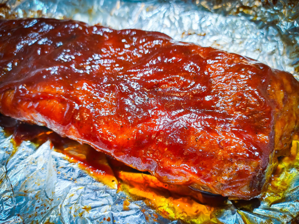 RIBS SLATHERED IN BARBECUE SAUCE