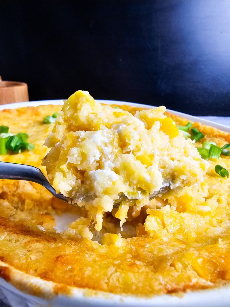 BIG SCOOP OF CORN CASSEROLE READY TO SERVE