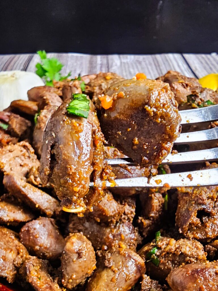 fork through a couple of sauteed chicken hearts