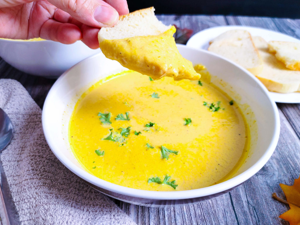 PUMPKIN APPLE SOUP WITH BREAD DIPPED