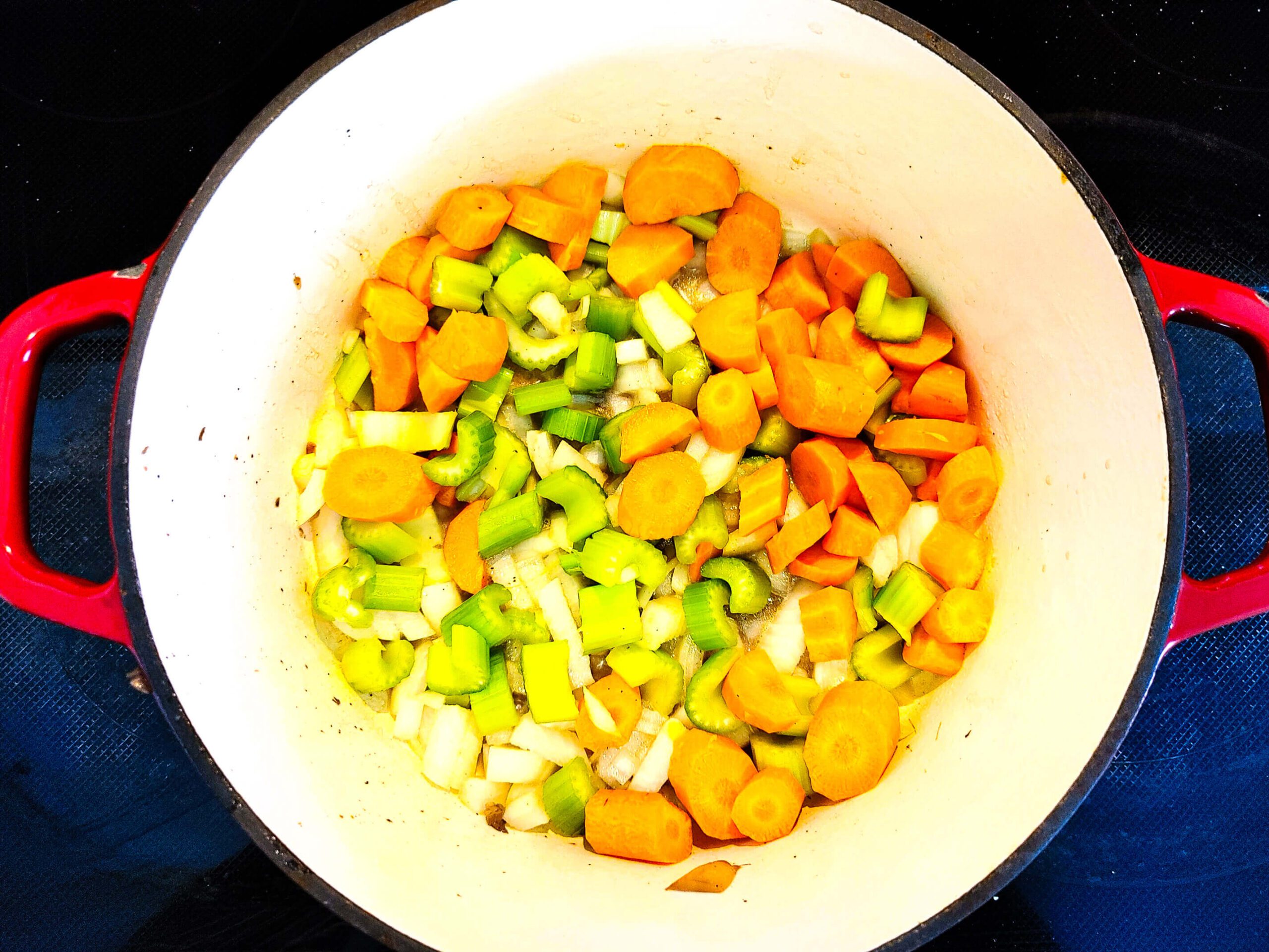 saute the aromatics onions celery and carrots