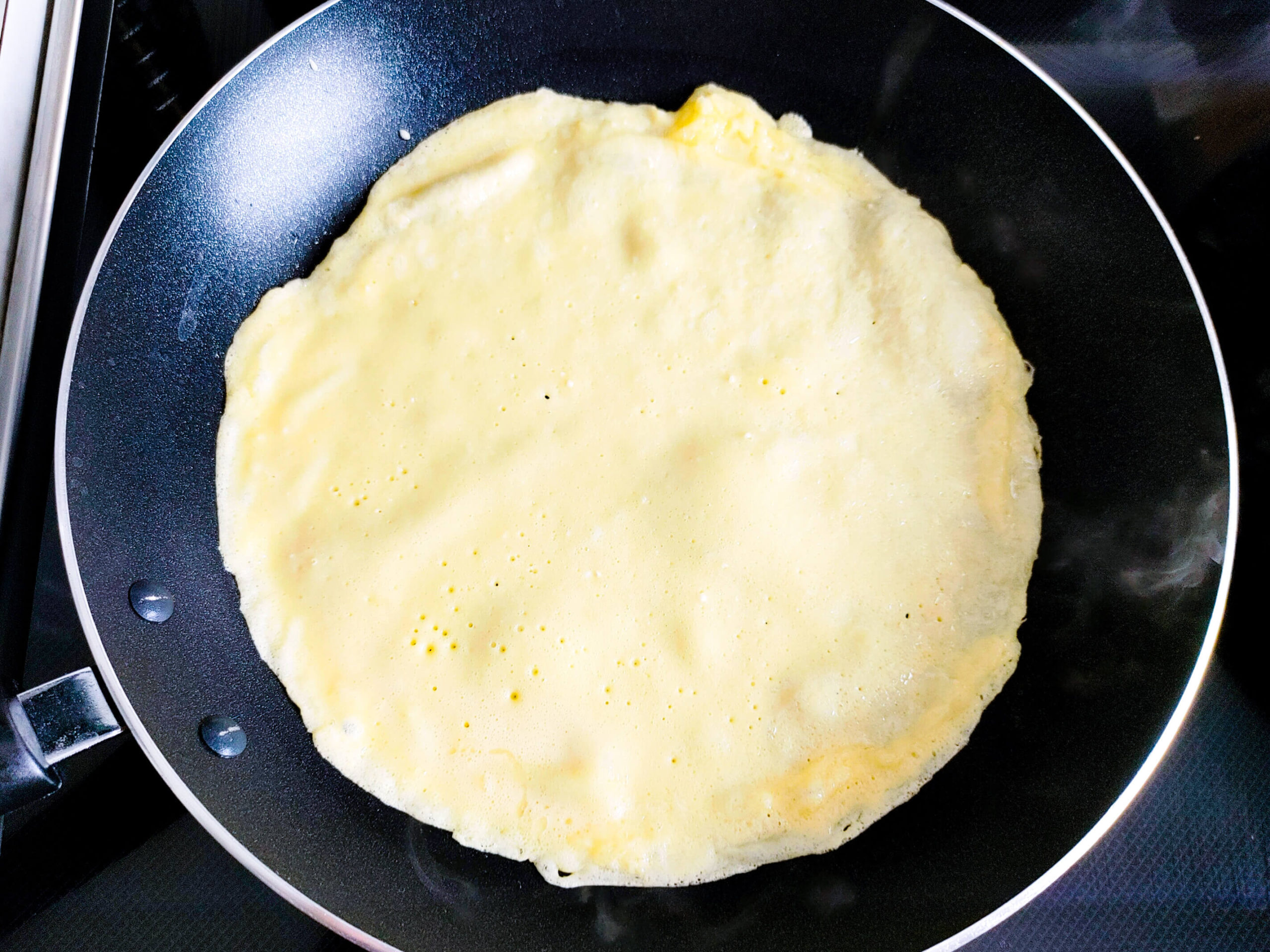 ladle the crepe batter