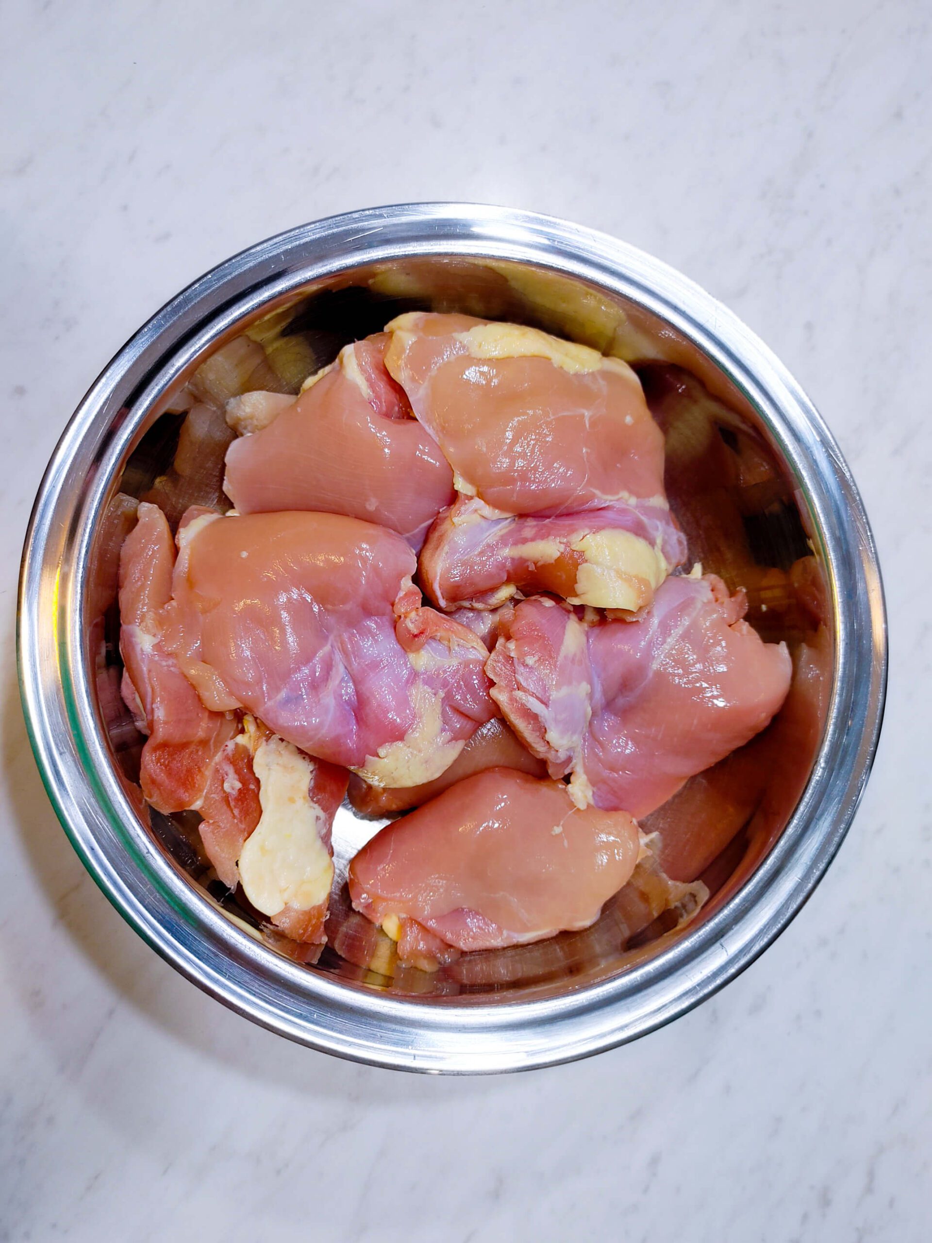 boneless skinless chicken thighs patted dry with paper towels before panko coating