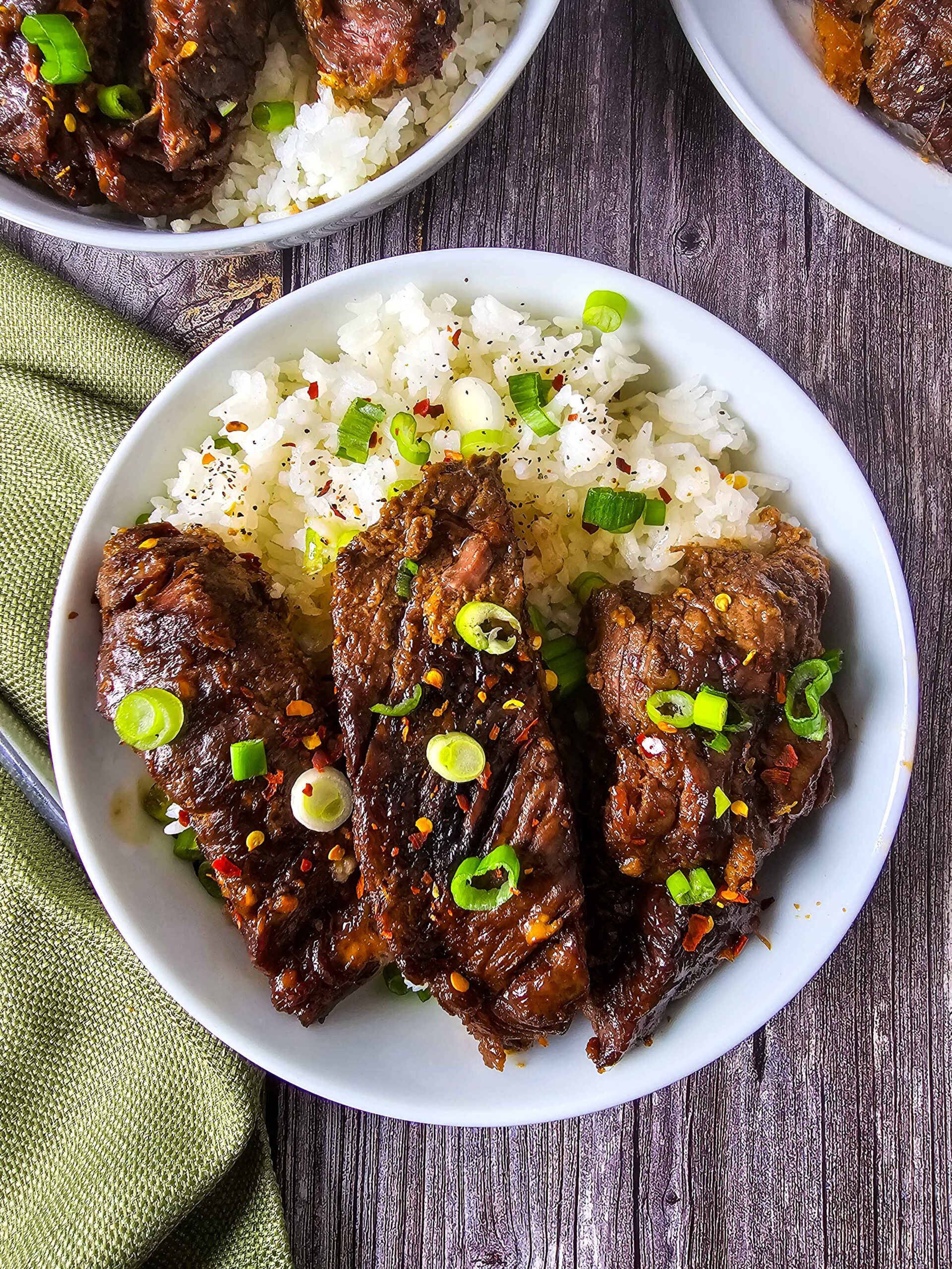 GARNISH AND SERVE ASIAN STYLE BEEF COUNTRY RIBS