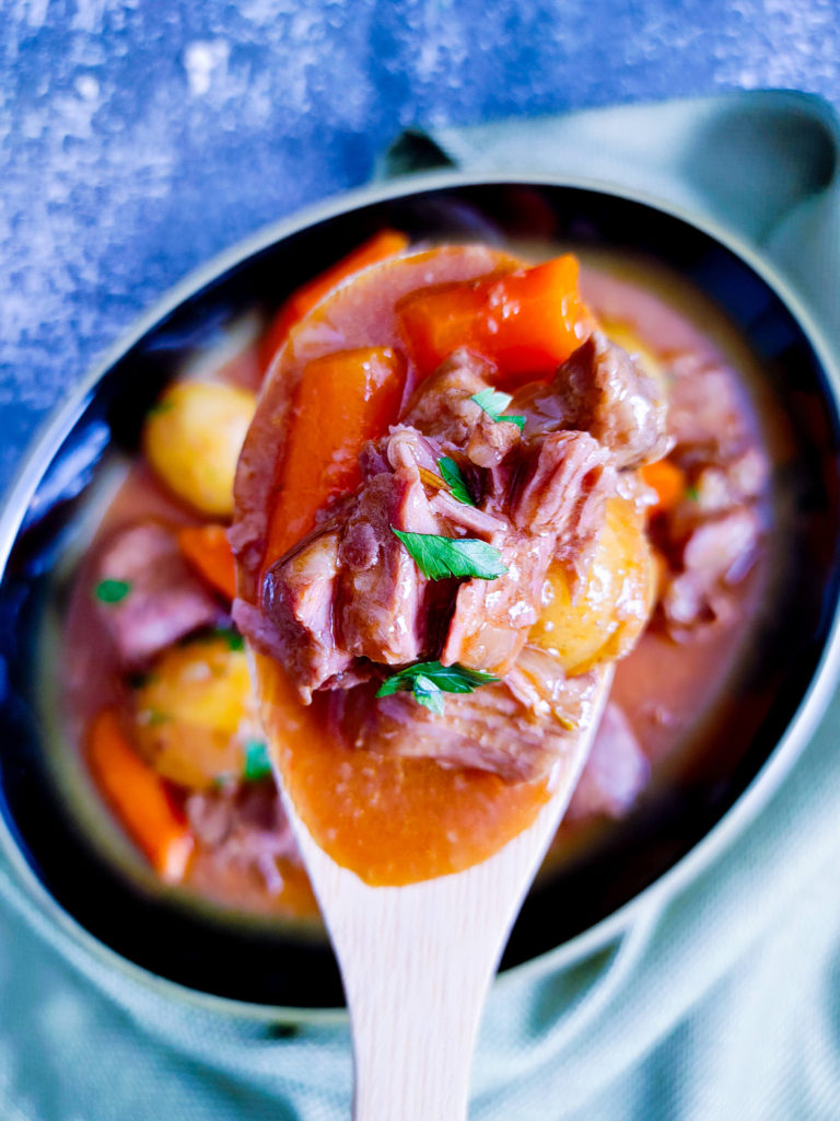 IRISH LAMB STEW ON A WOODEN SPOON