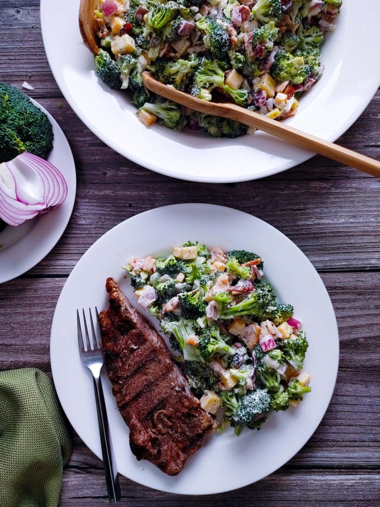 DINNER SPREAD SERVED WITH STEAK AND CREAMY BROCCOLI SALAD