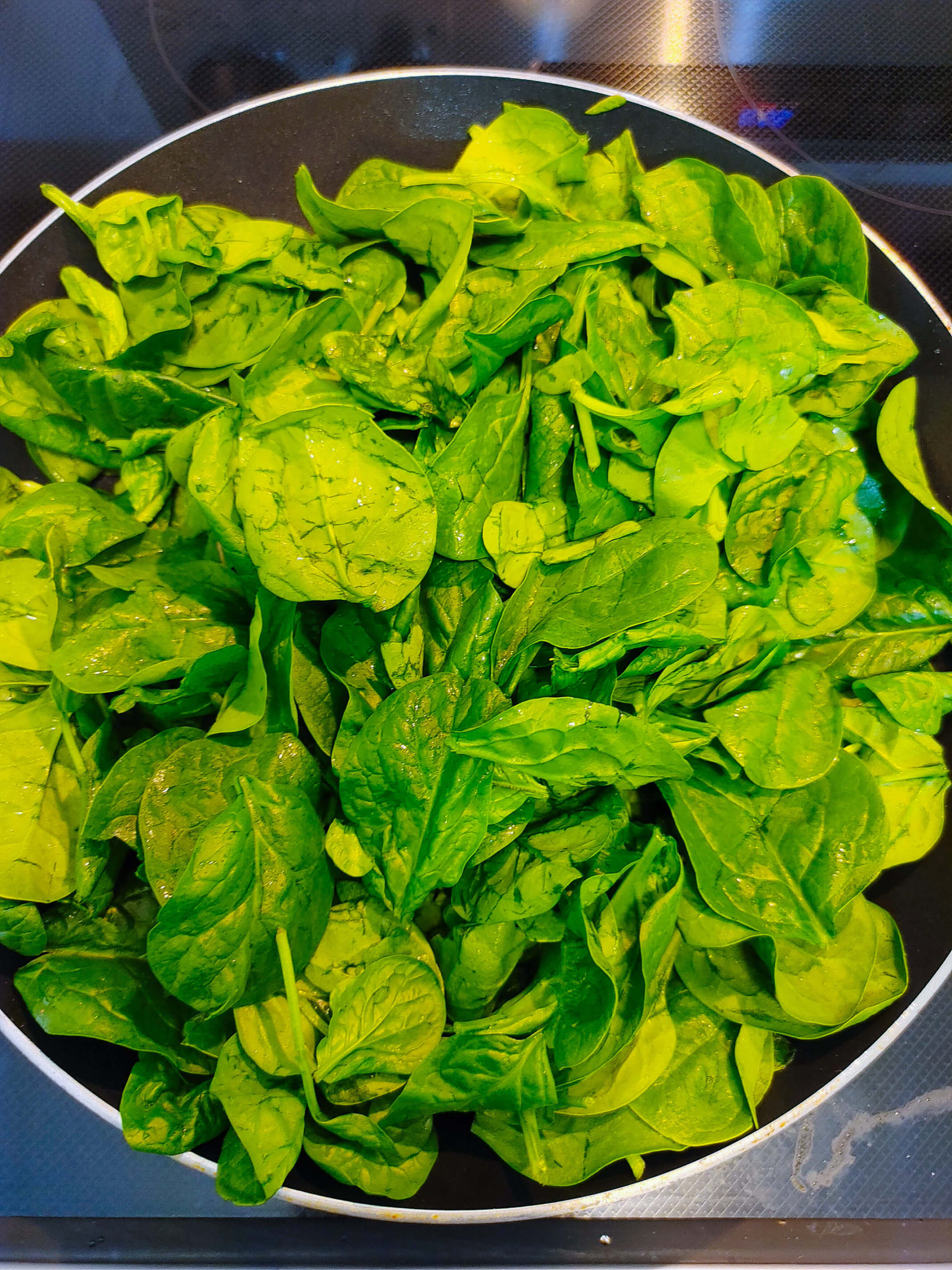 ADD SPINACH TO THE PAN AND SAUTE