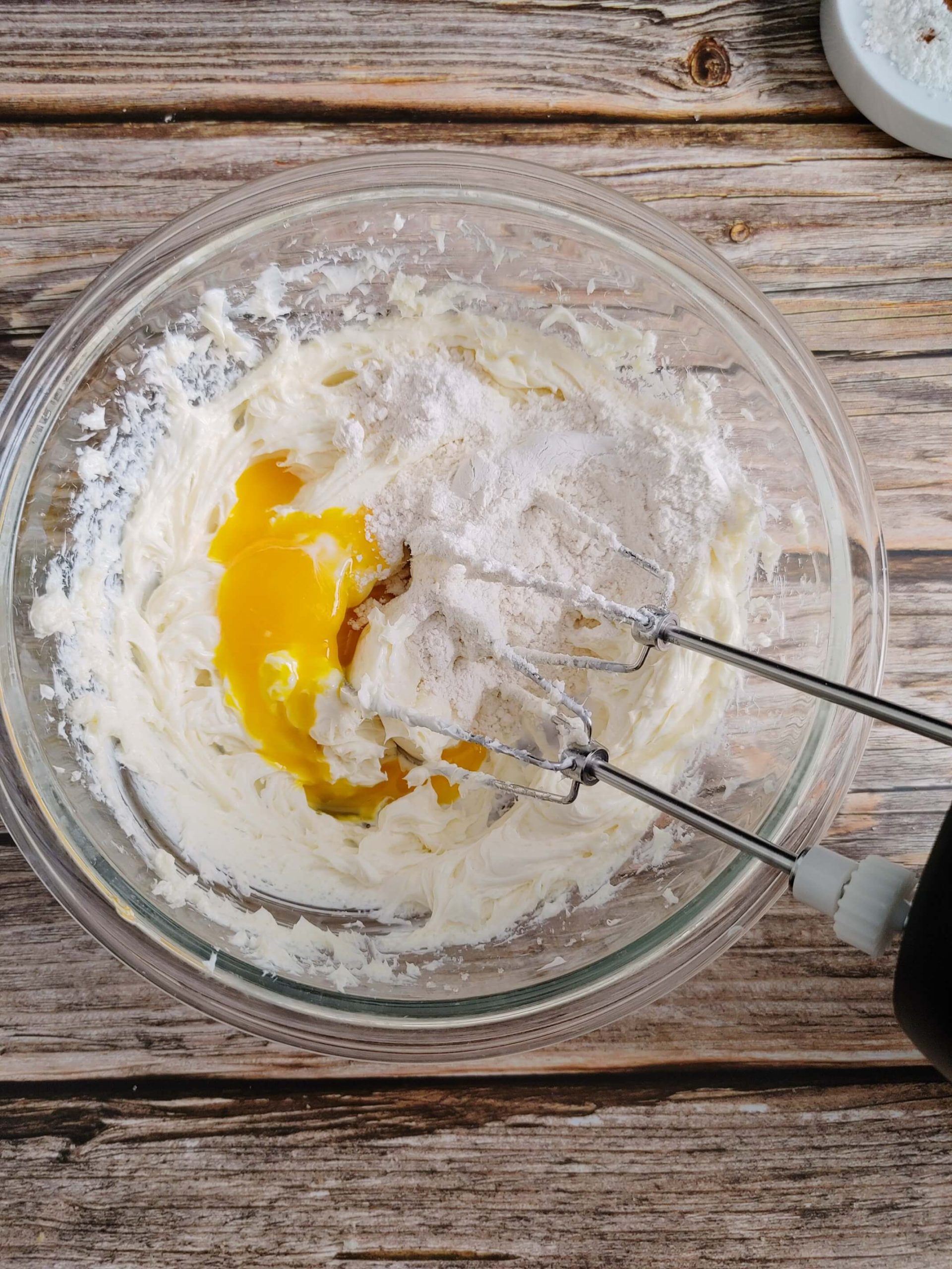 BEAT THE CREAM CHEESE, EGG, VANILLA EXTRACT AND SUGAR