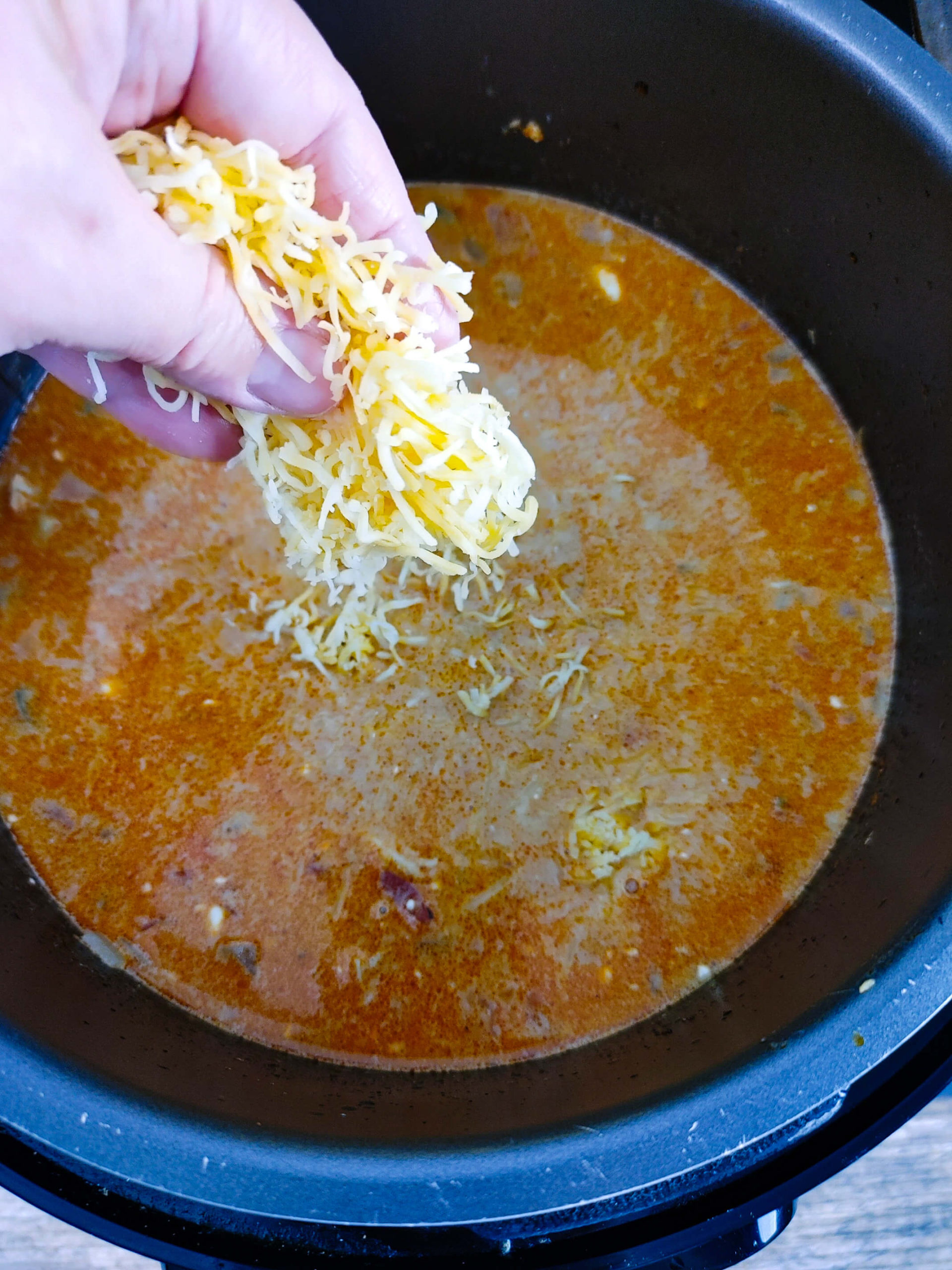 ADD THE MEXICAN STYLE SHREDDED CHEESE.