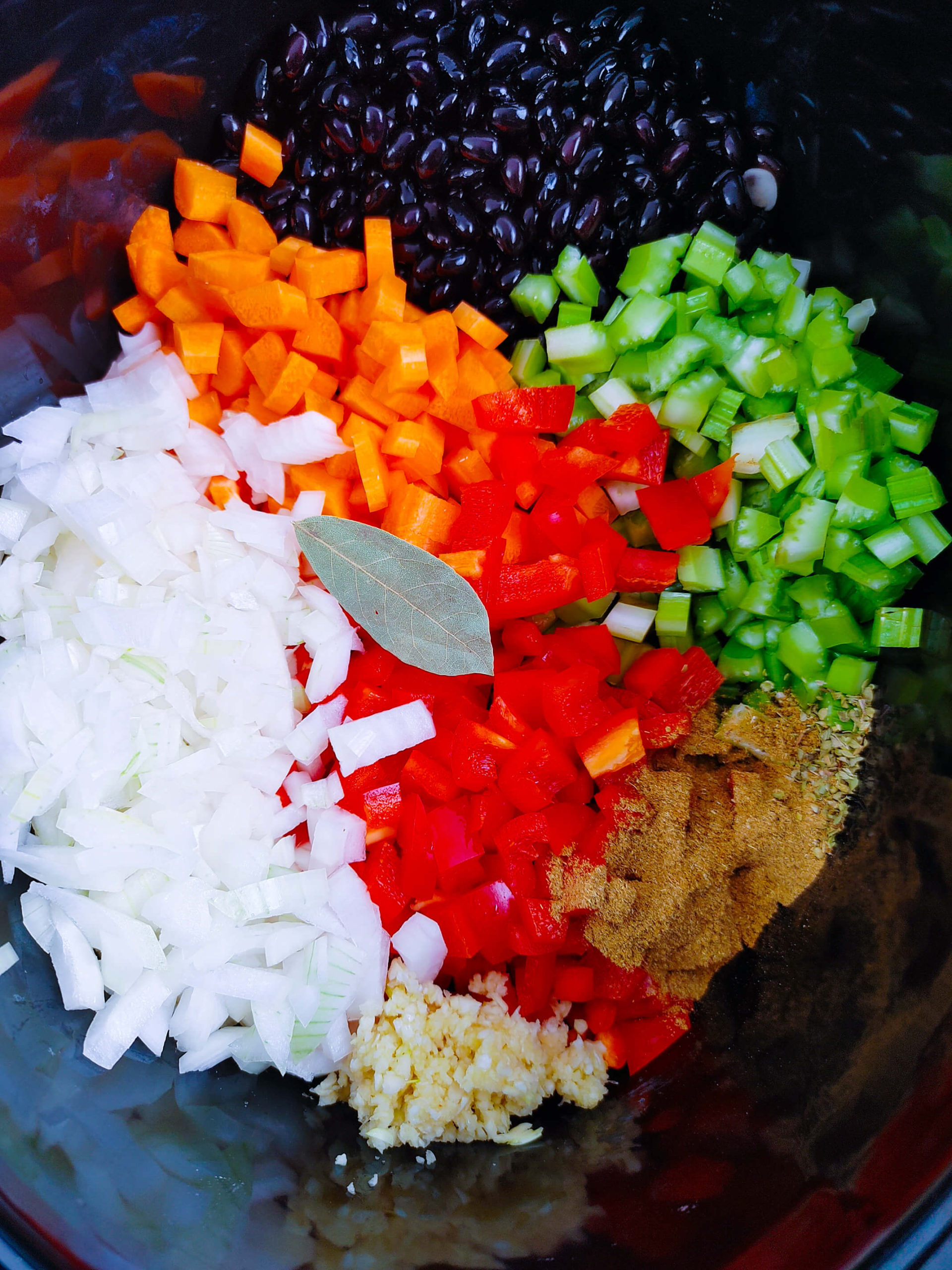 CHOP ALL VEGETABLES AND ADD SPICES TO SLOW COOKER