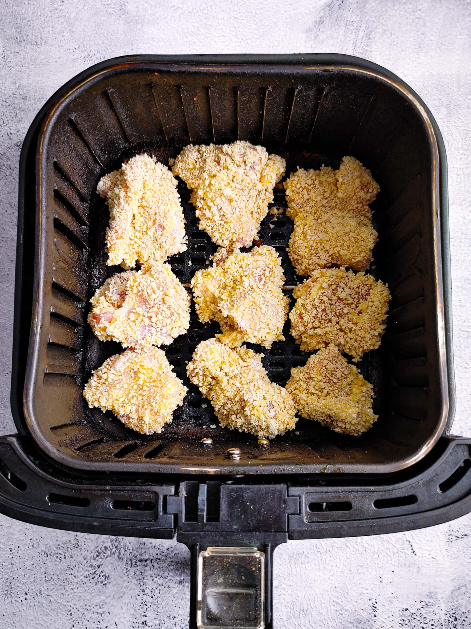PLACE THE CHICKEN BITES INTO THE AIR FRYER BASKET