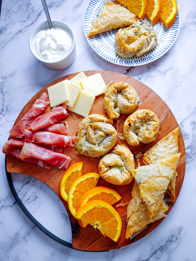 PLATED SPINACH AND FETA SERVED WITH SMOKED HAM AND CHEESES