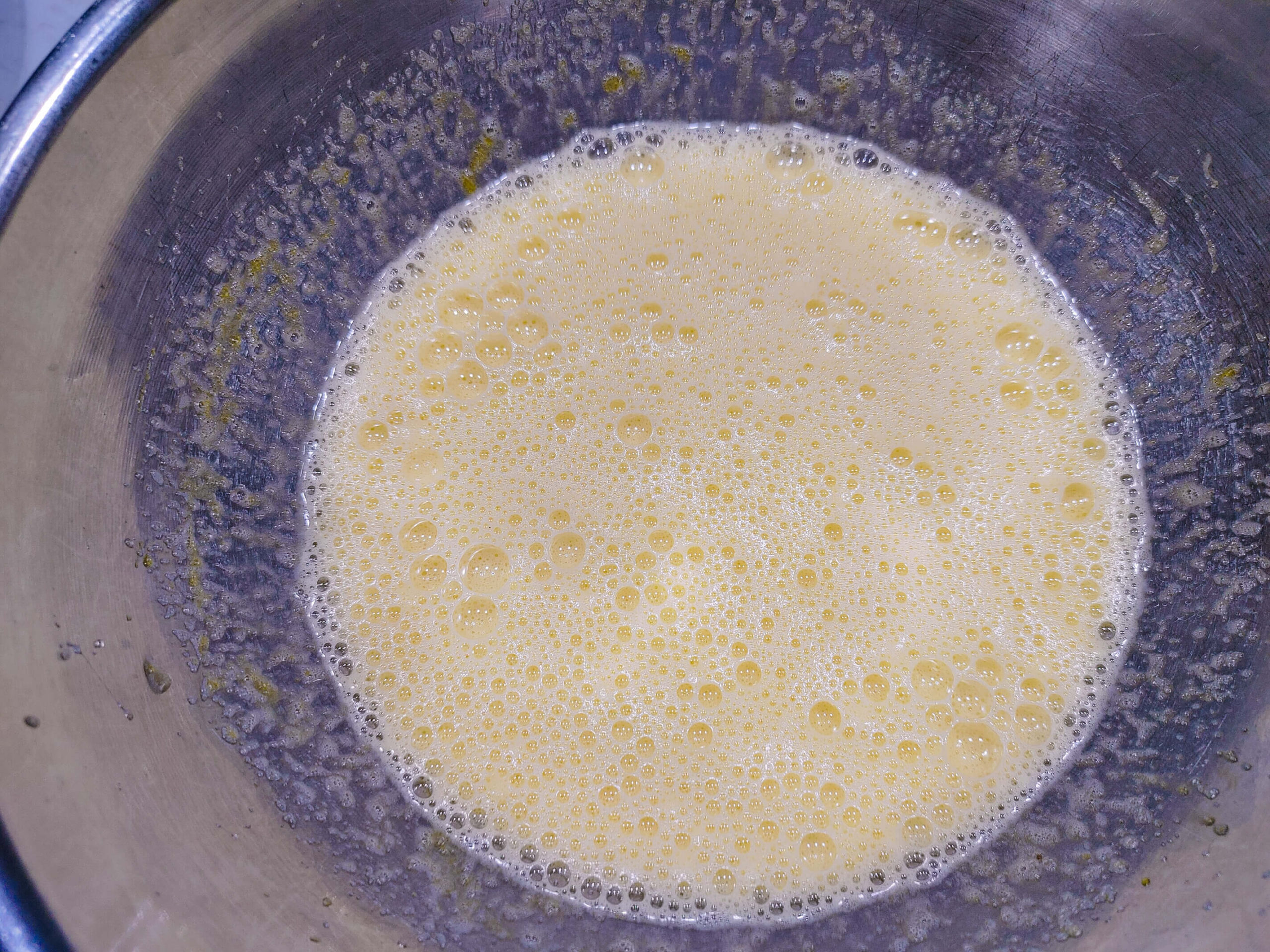 WHISK TOGETHER EGGS SUGAR AND VANILLA UNTIL FROTHY