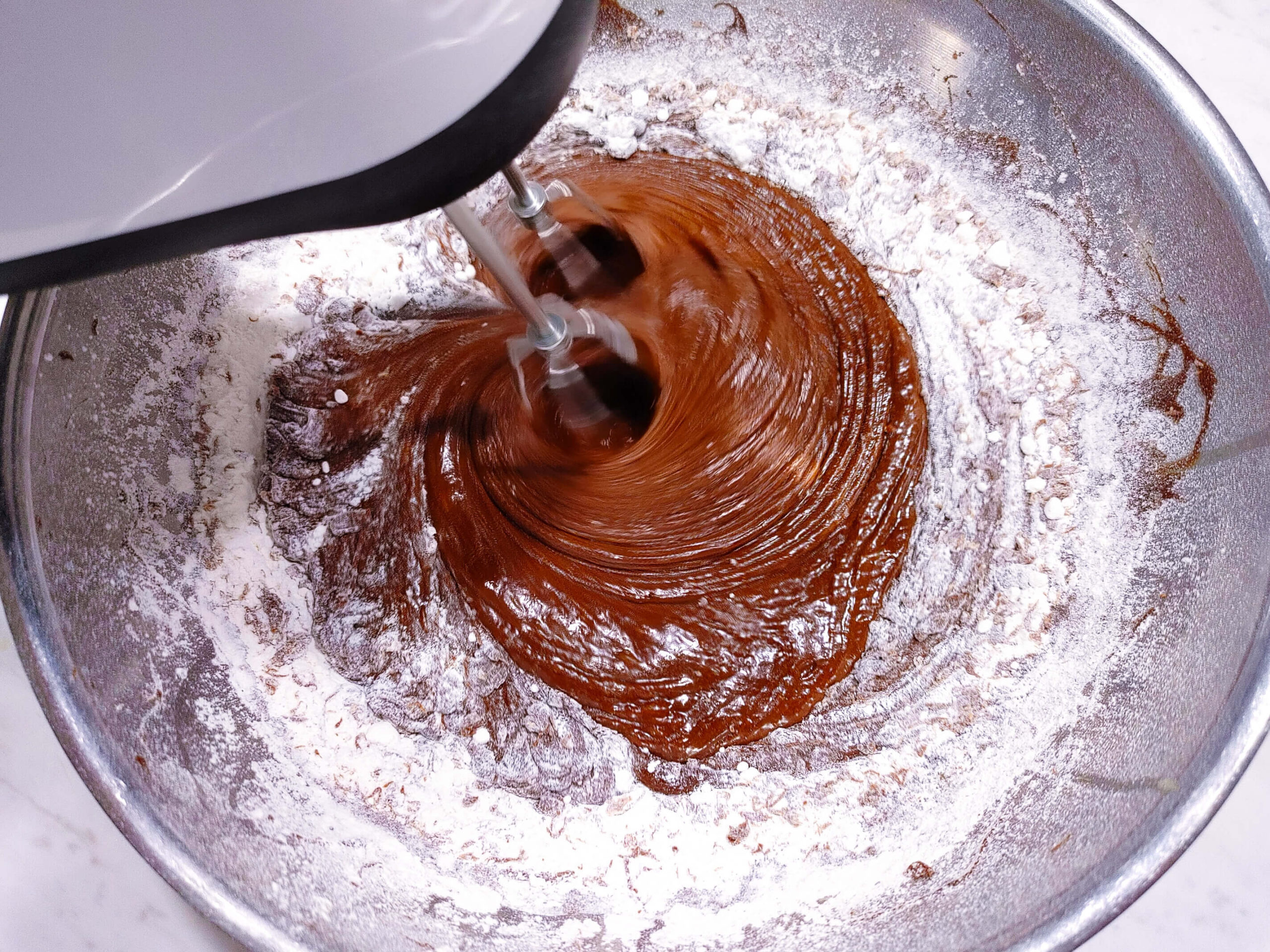 COMBINE THE FLOUR AND CHOCOLATE INGREDIENTS TOGETHER