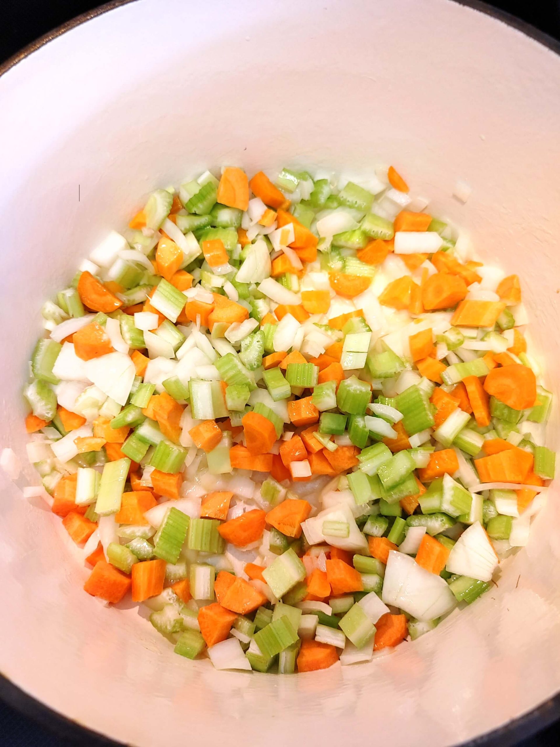 CHOP THE ONIONS, CARROTS, AND CELERY