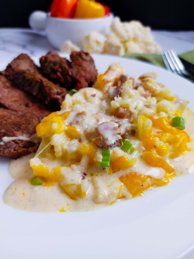 PLATED LOW CARB CAULIFLOWER CASSEROLE SERVED WITH LONDON BROIL