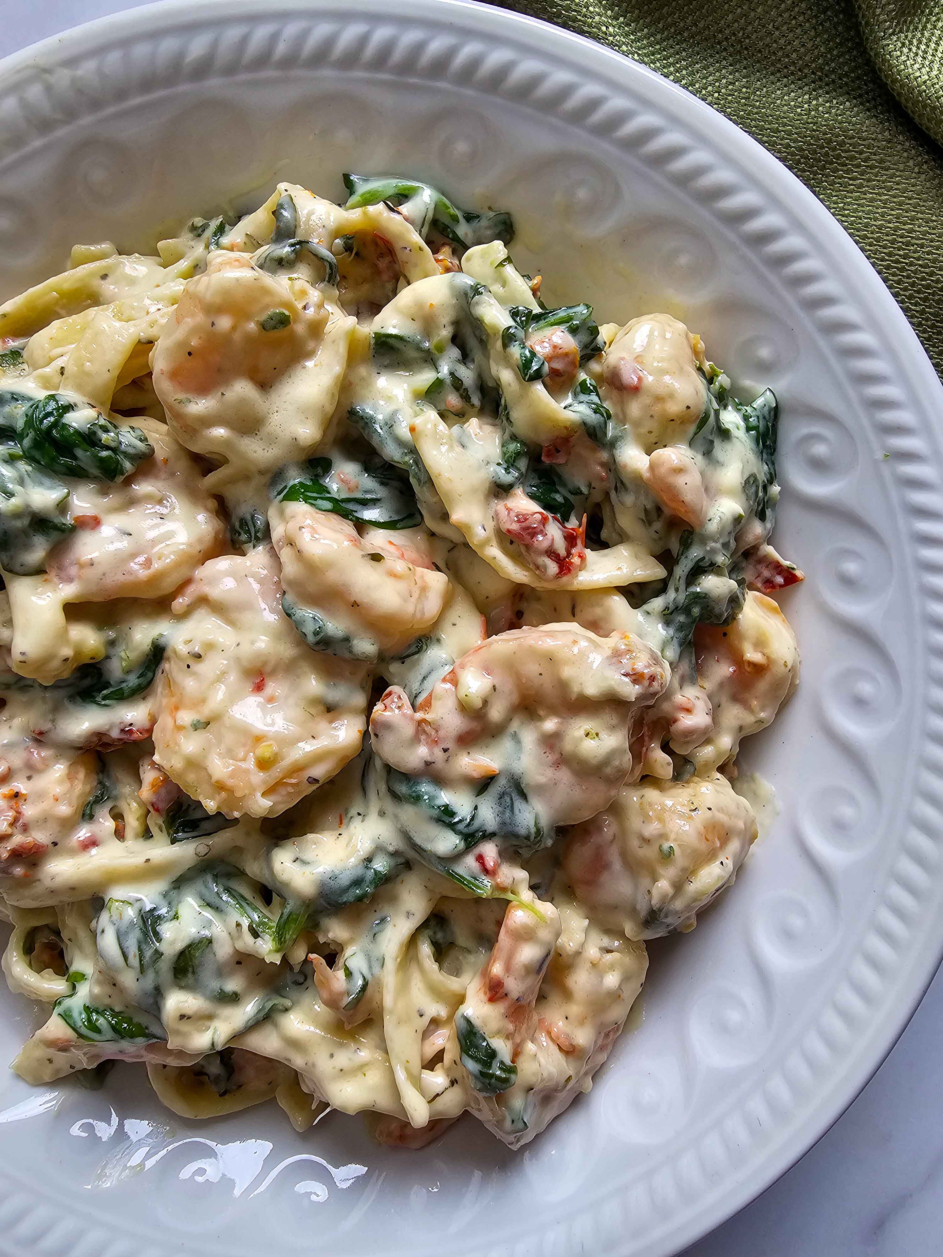 BOWL FULL OF TUSCAN SHRIMP PASTA