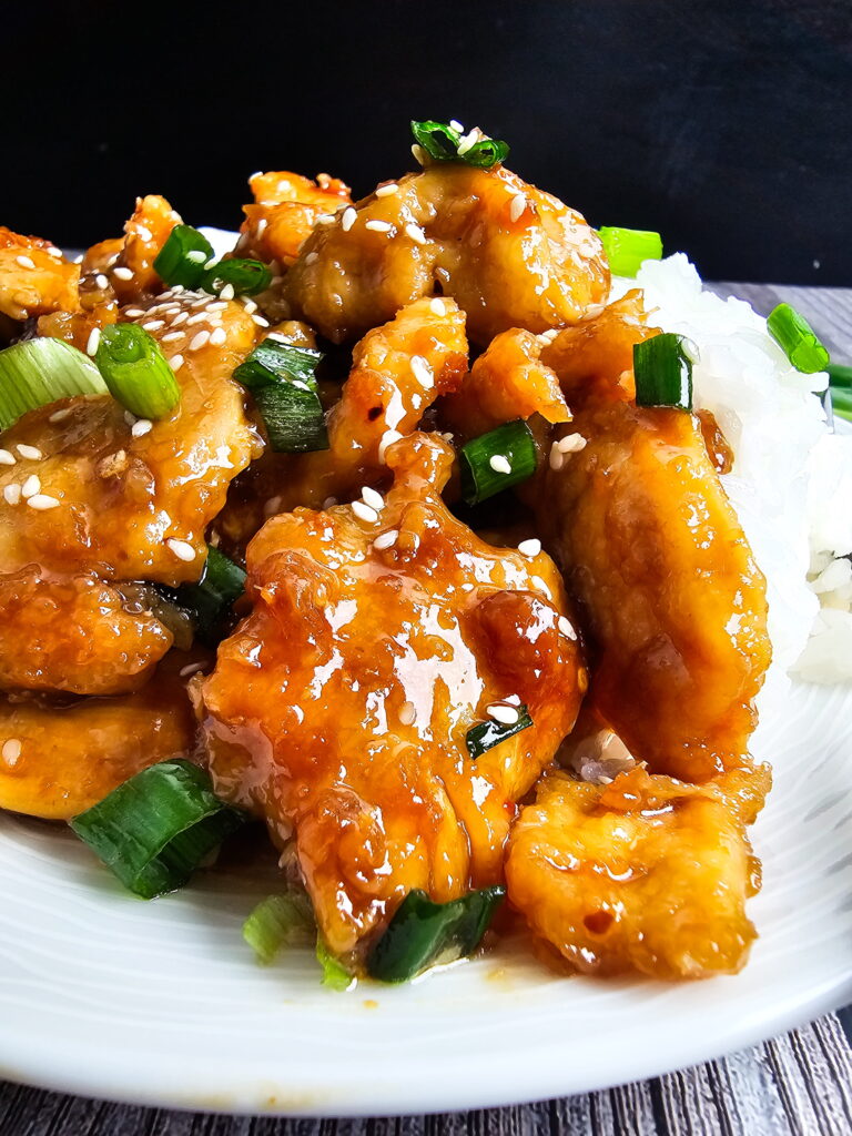 Better than takeout Mongolian chicken with tender seared chicken pieces coated in sticky soy garlic sauce.