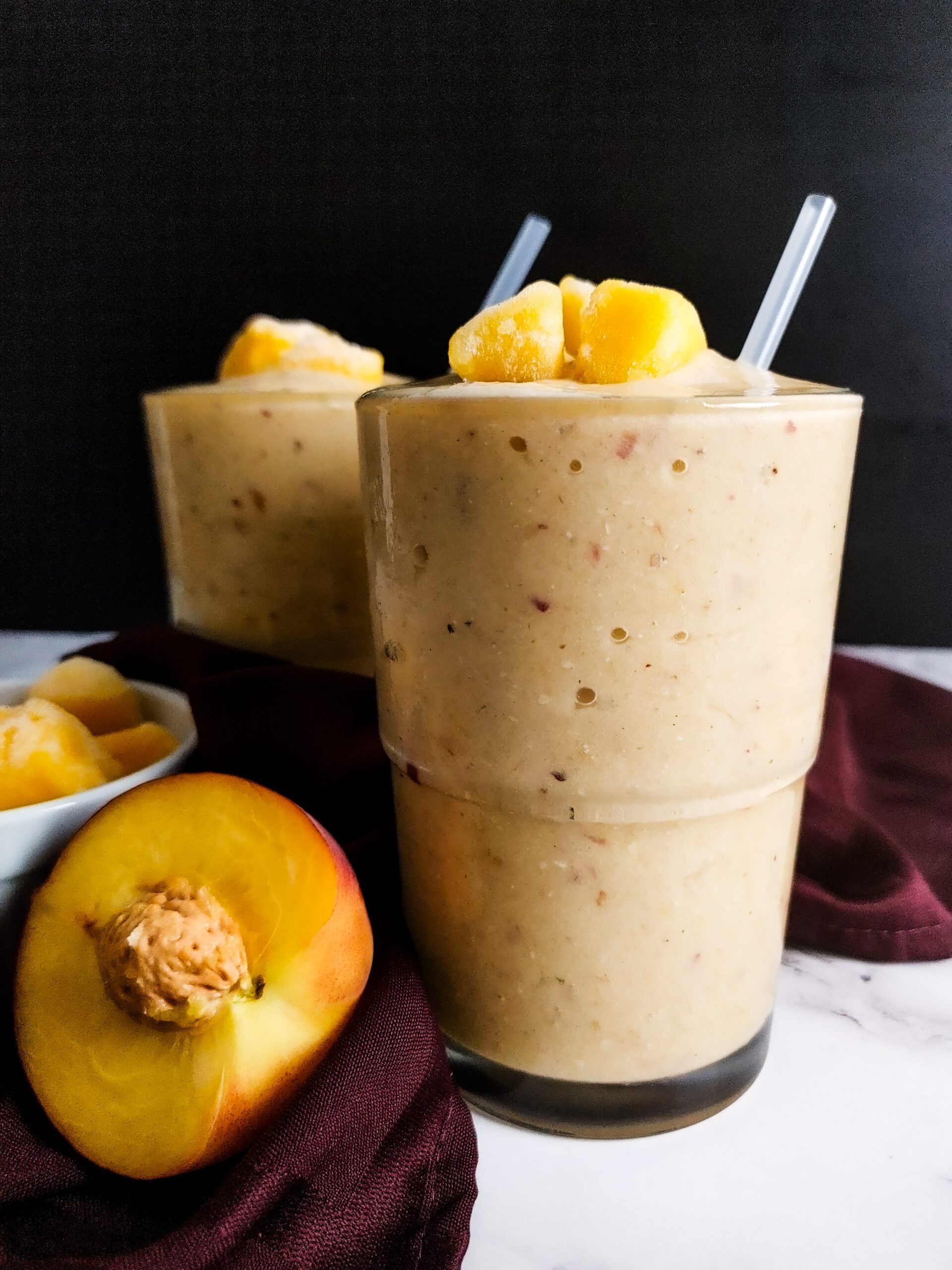 POUR PEACH MANGO SMOOTHIE INTO GLASSES AND SERVE